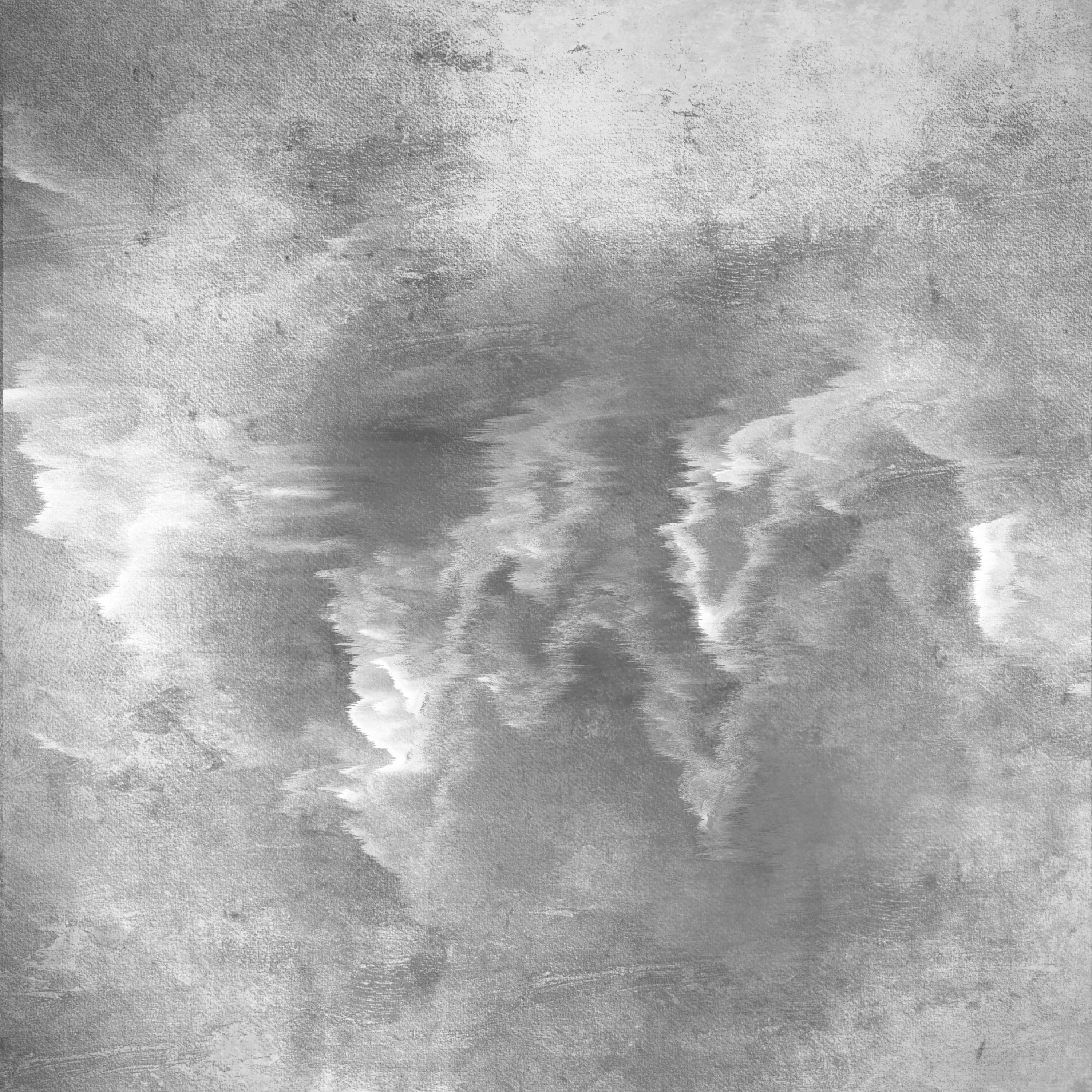 a black and white image of clouds in the sky