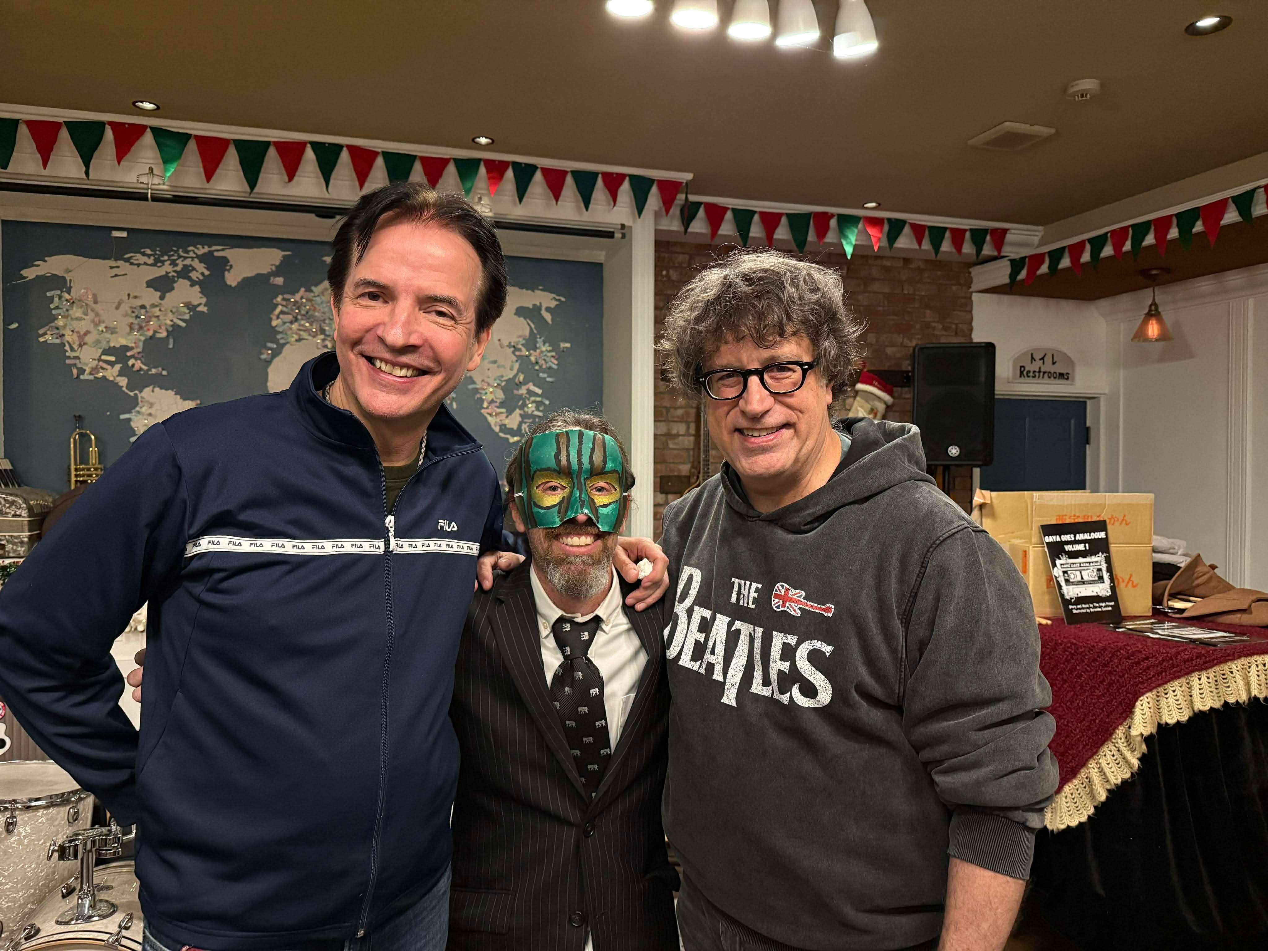 three men posing for a picture