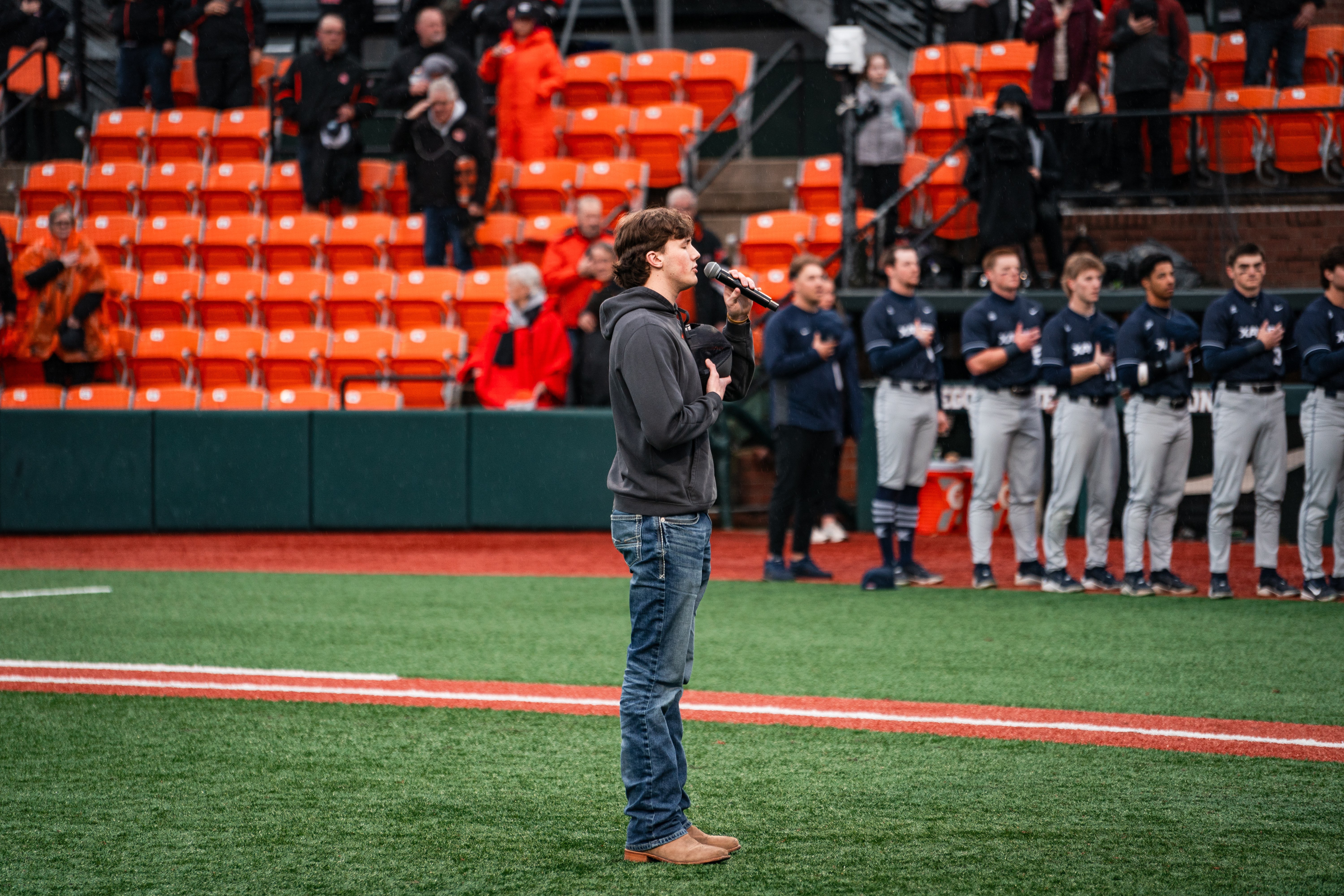 a man standing on a baseball field