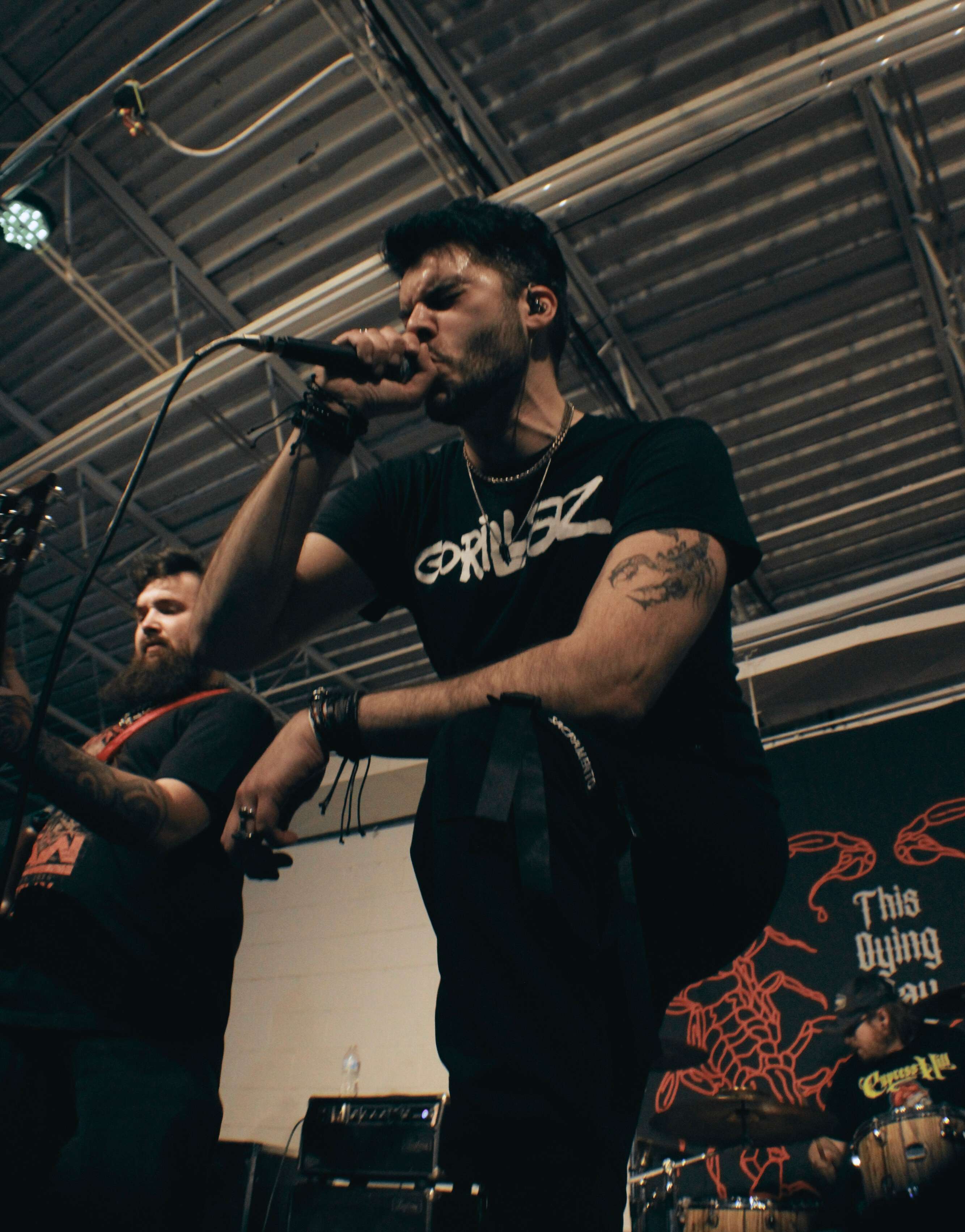 a man on stage with a microphone