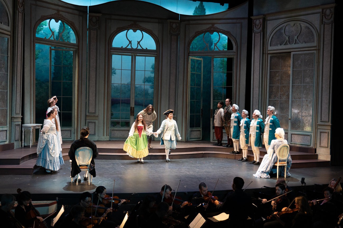 a group of people standing on a stage