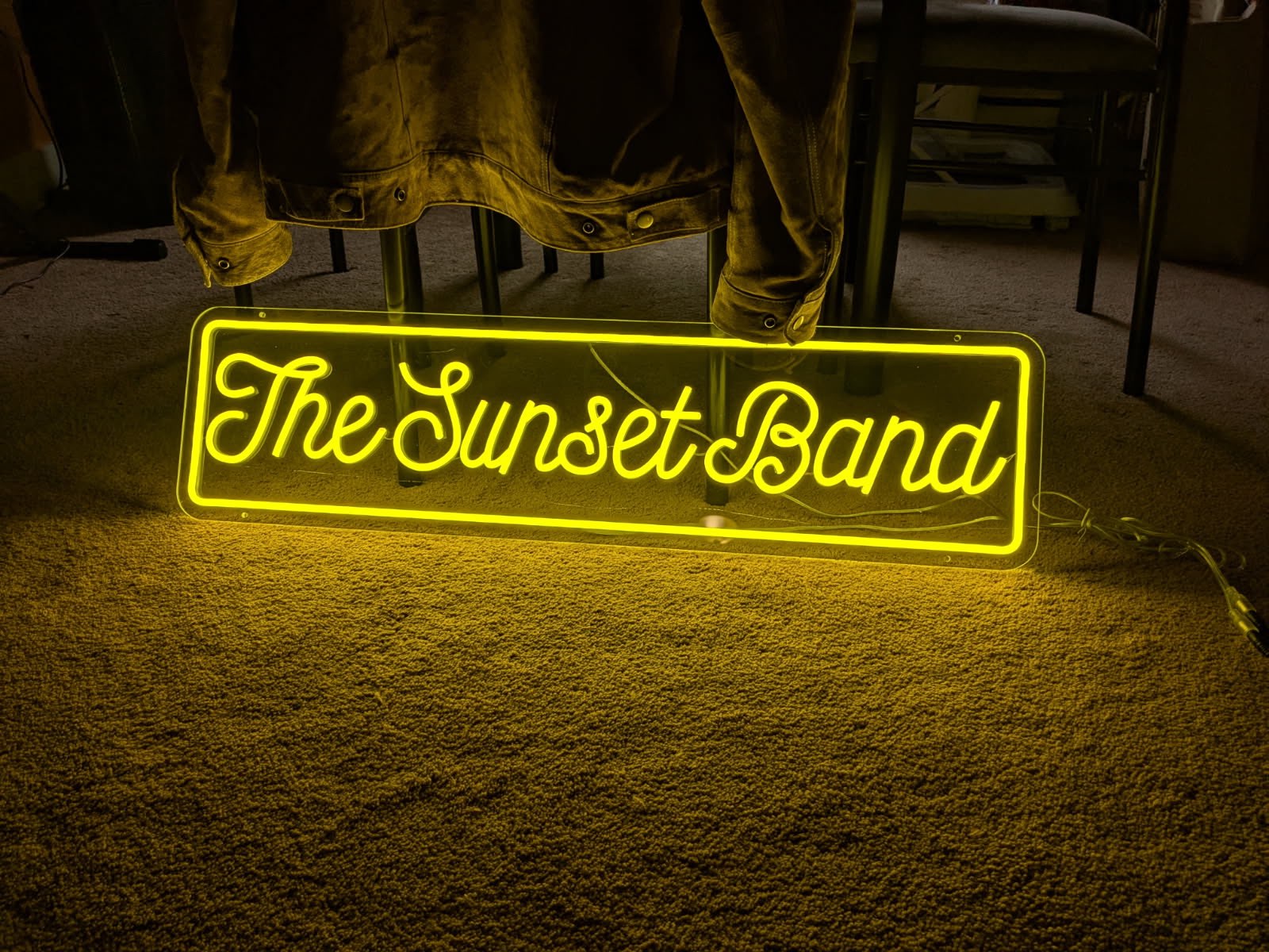 the sunset band neon sign