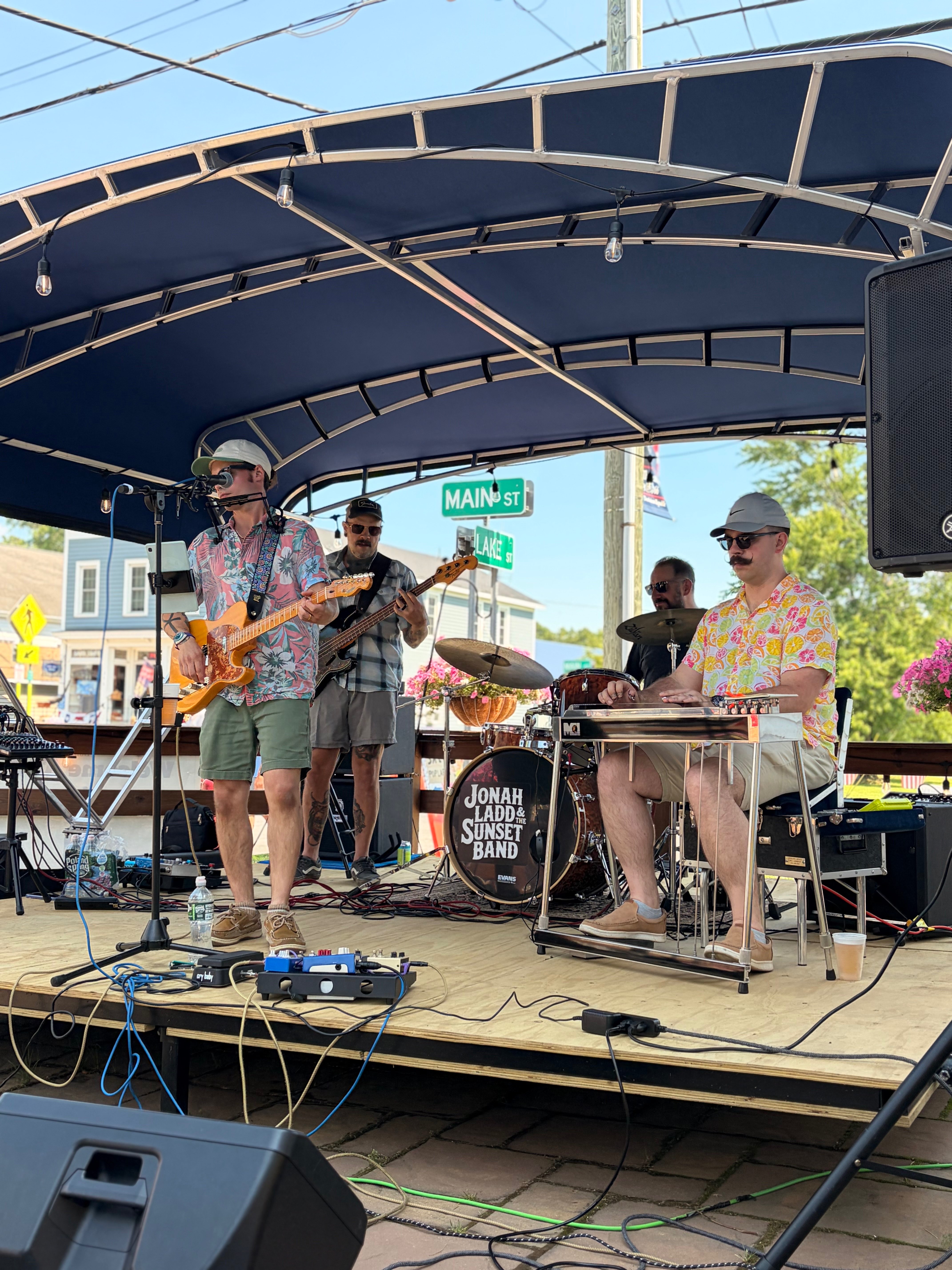 a group of people playing music on a stage
