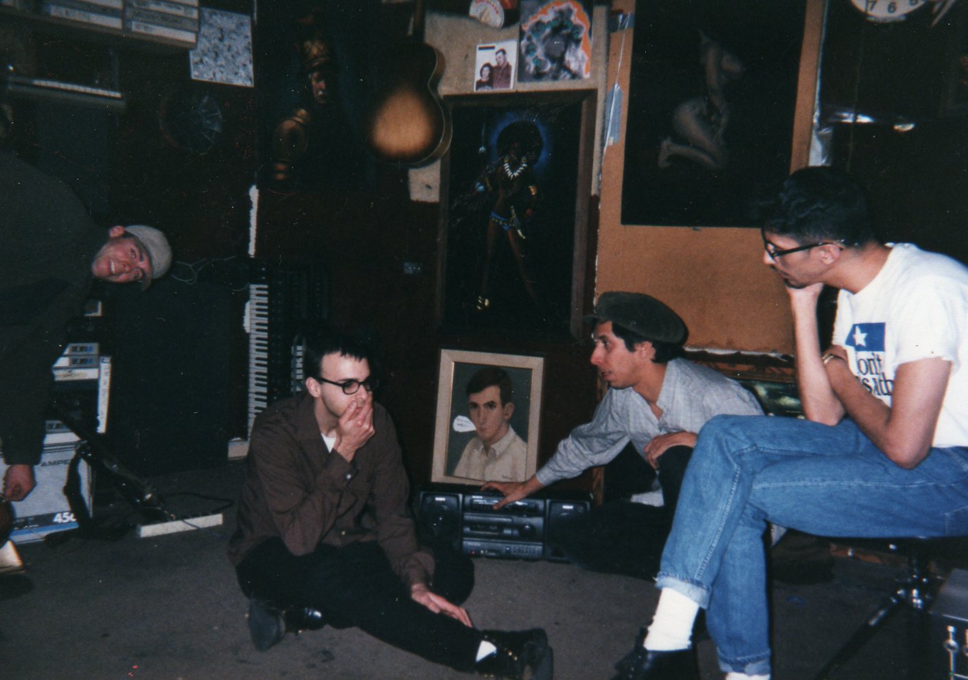 a group of people sitting on the floor in a room