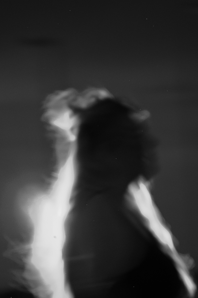 a black and white photo of a woman