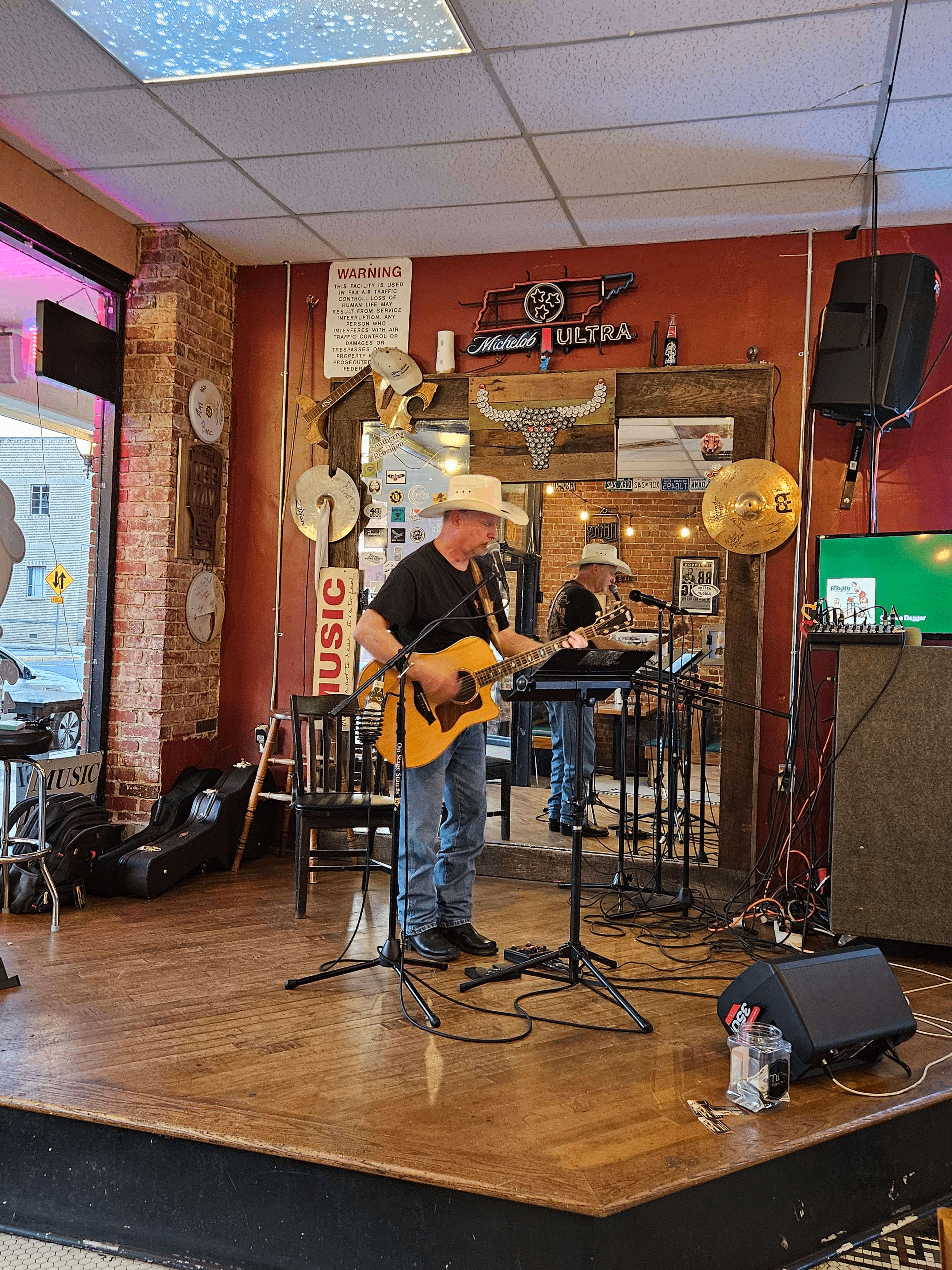 a group of people playing music in a room