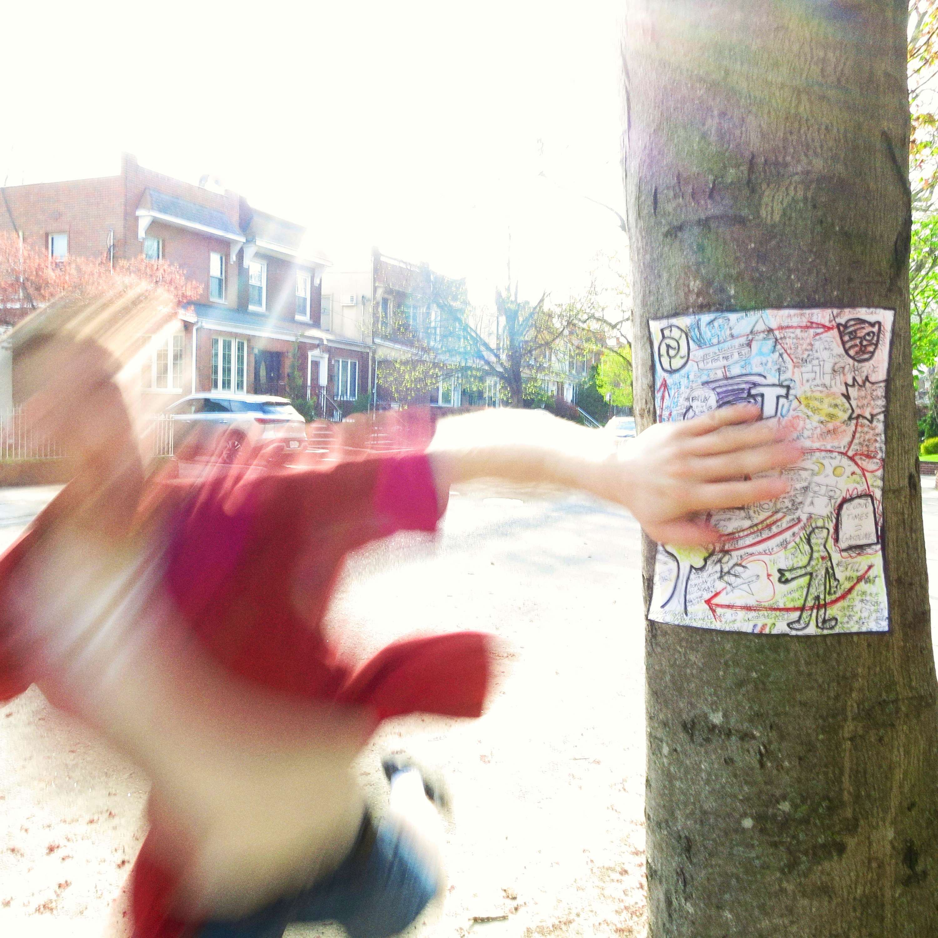 Yoder - Rabbit Holes: a man is reaching for a piece of paper on a tree