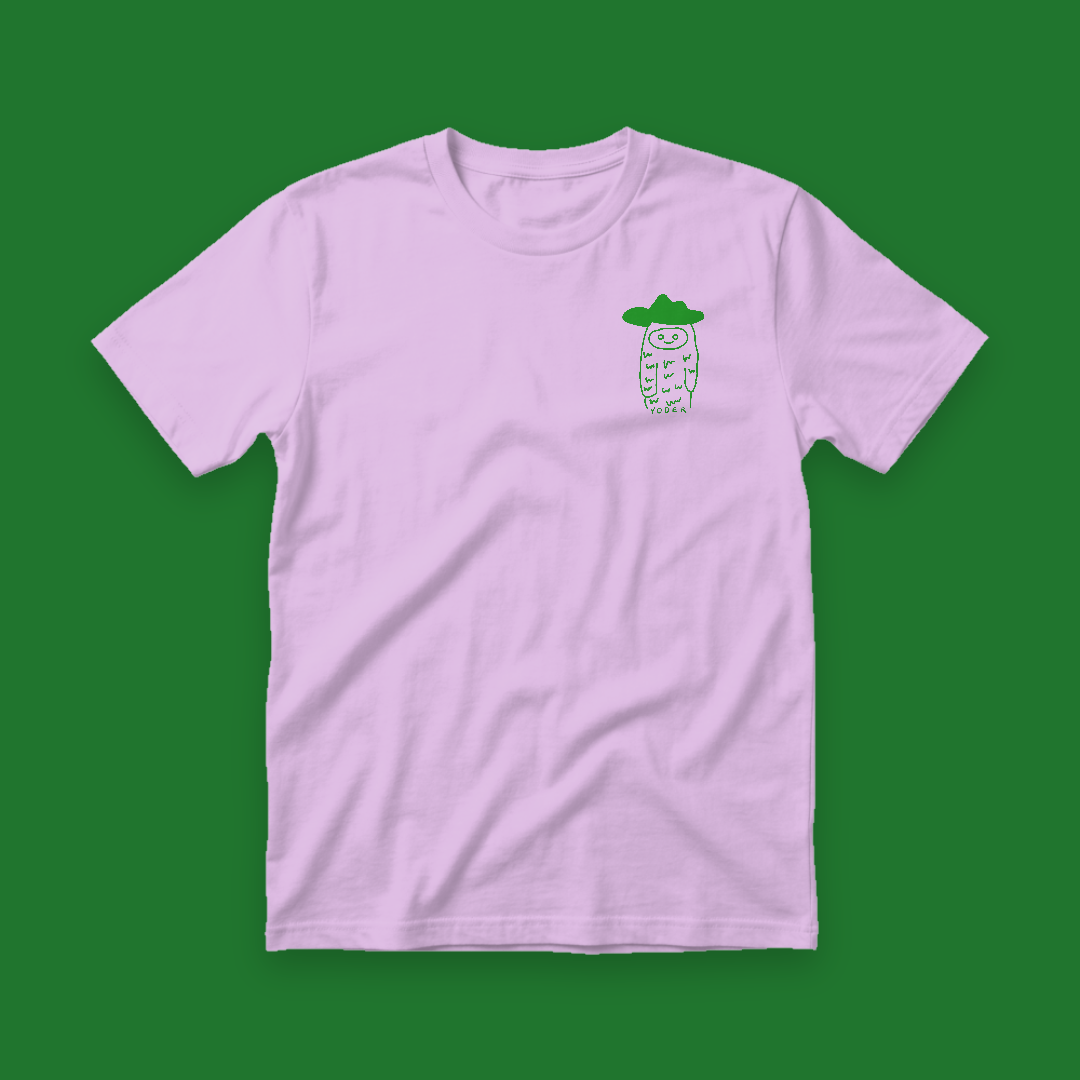 a pink t - shirt with a green flower on it