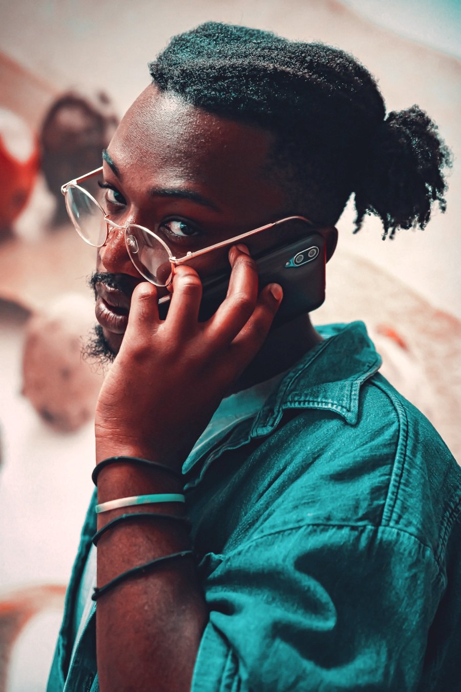 a man talking on a cell phone