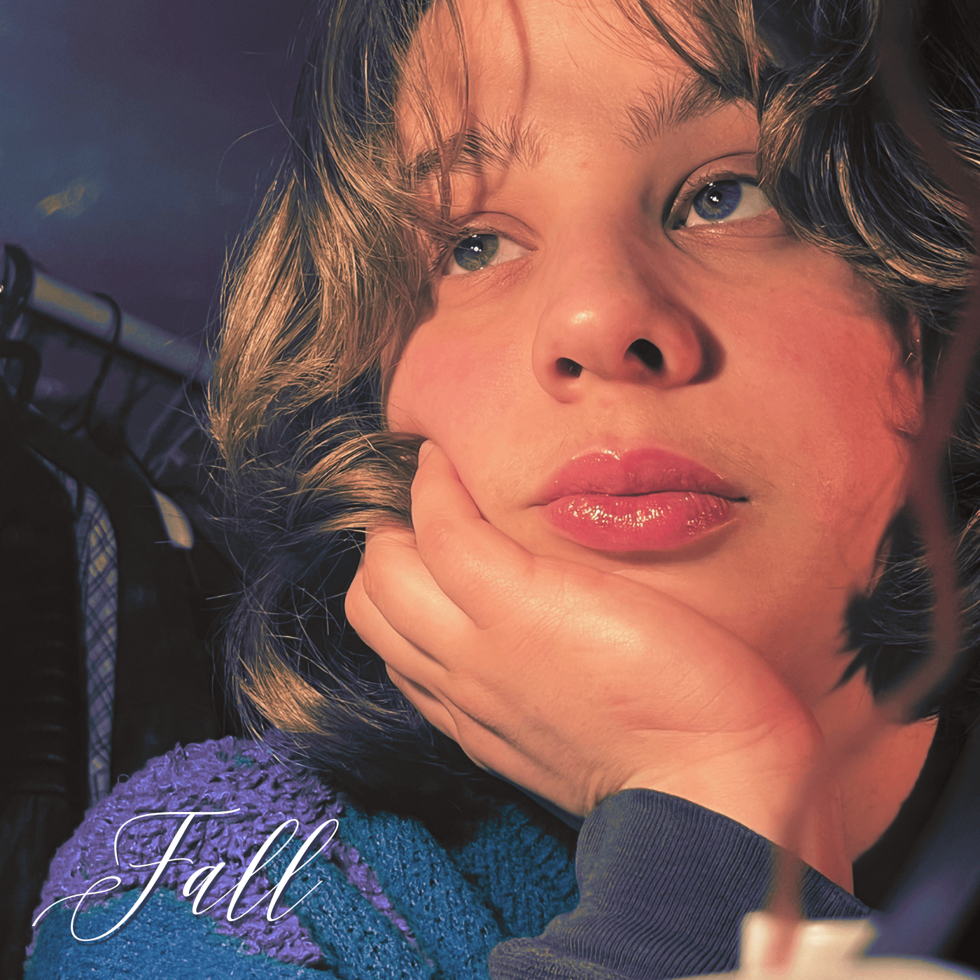 Ella Güdel - Fall (Demo): a young girl with curly hair looking at the camera