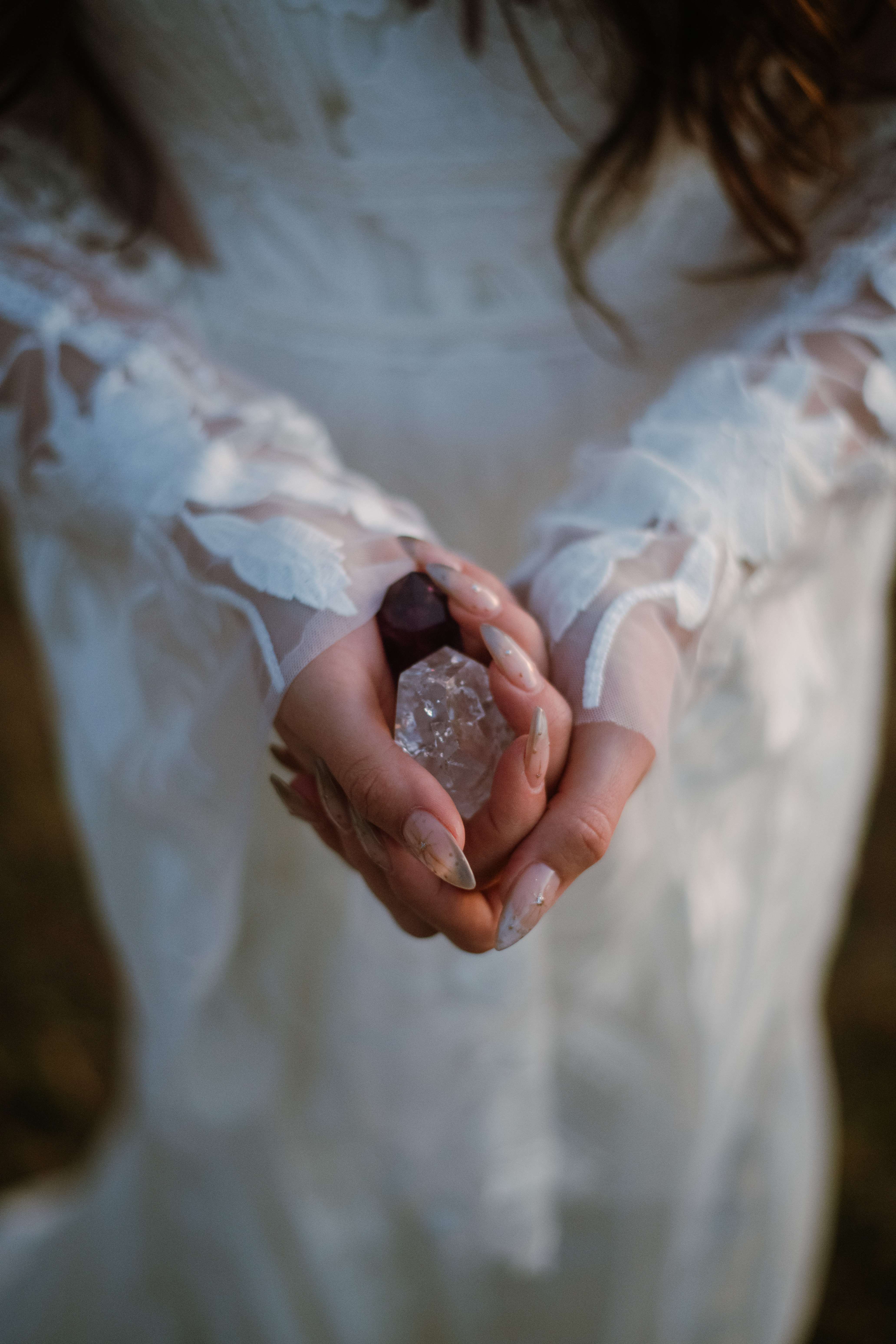 Mackenzie Morrow tip jar: a bride holding a crystal in her hand