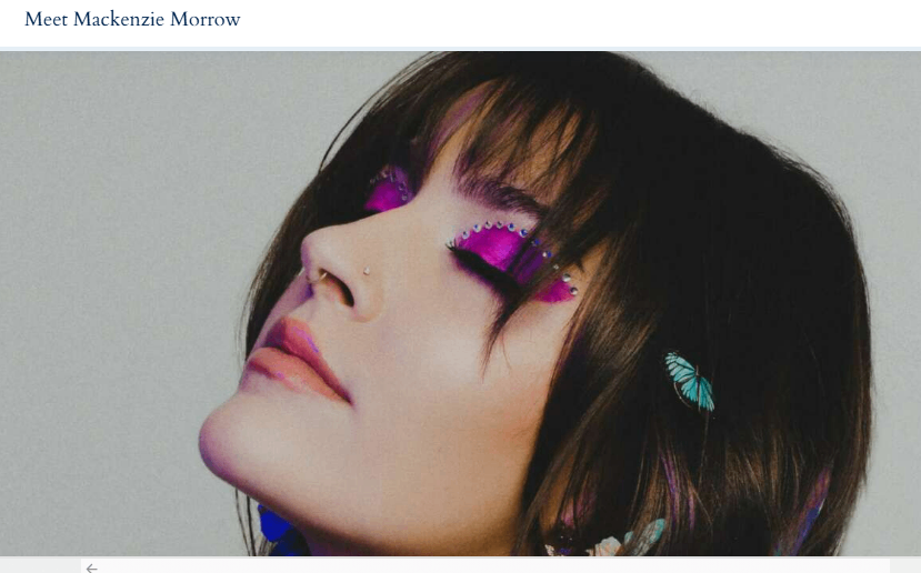 a photo of a woman with purple eye makeup