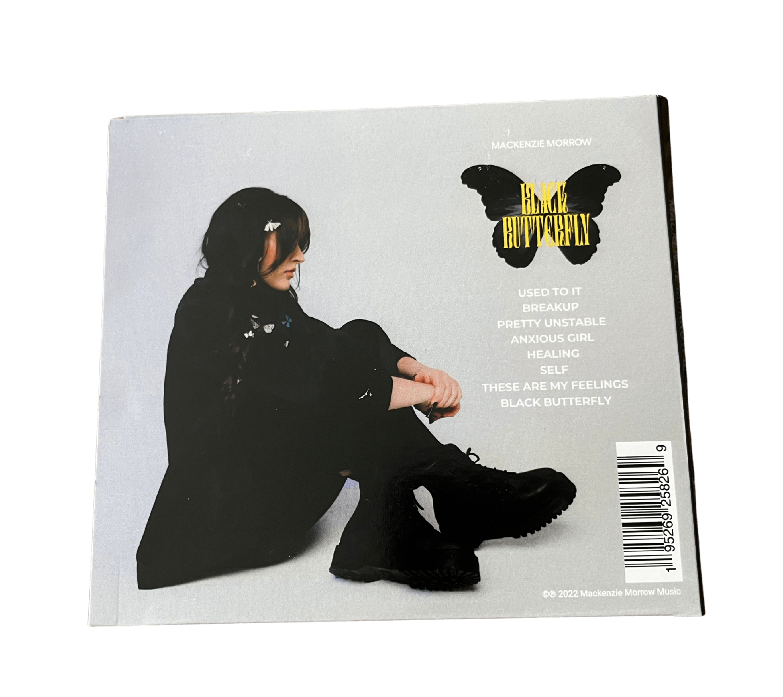 the cover of a magazine with a butterfly on it