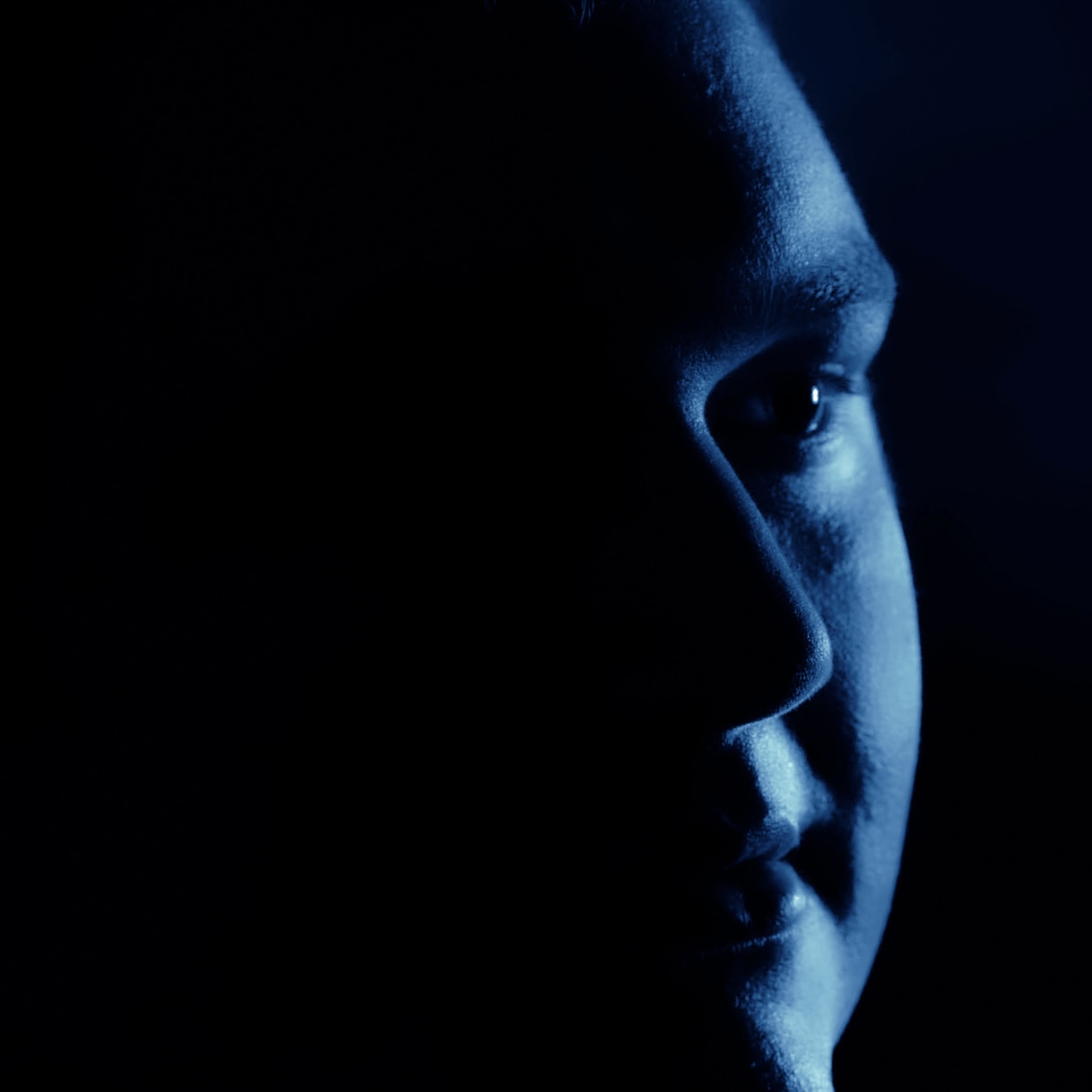 Blue Sinclair - Fleeting: a silhouette of a man in the dark