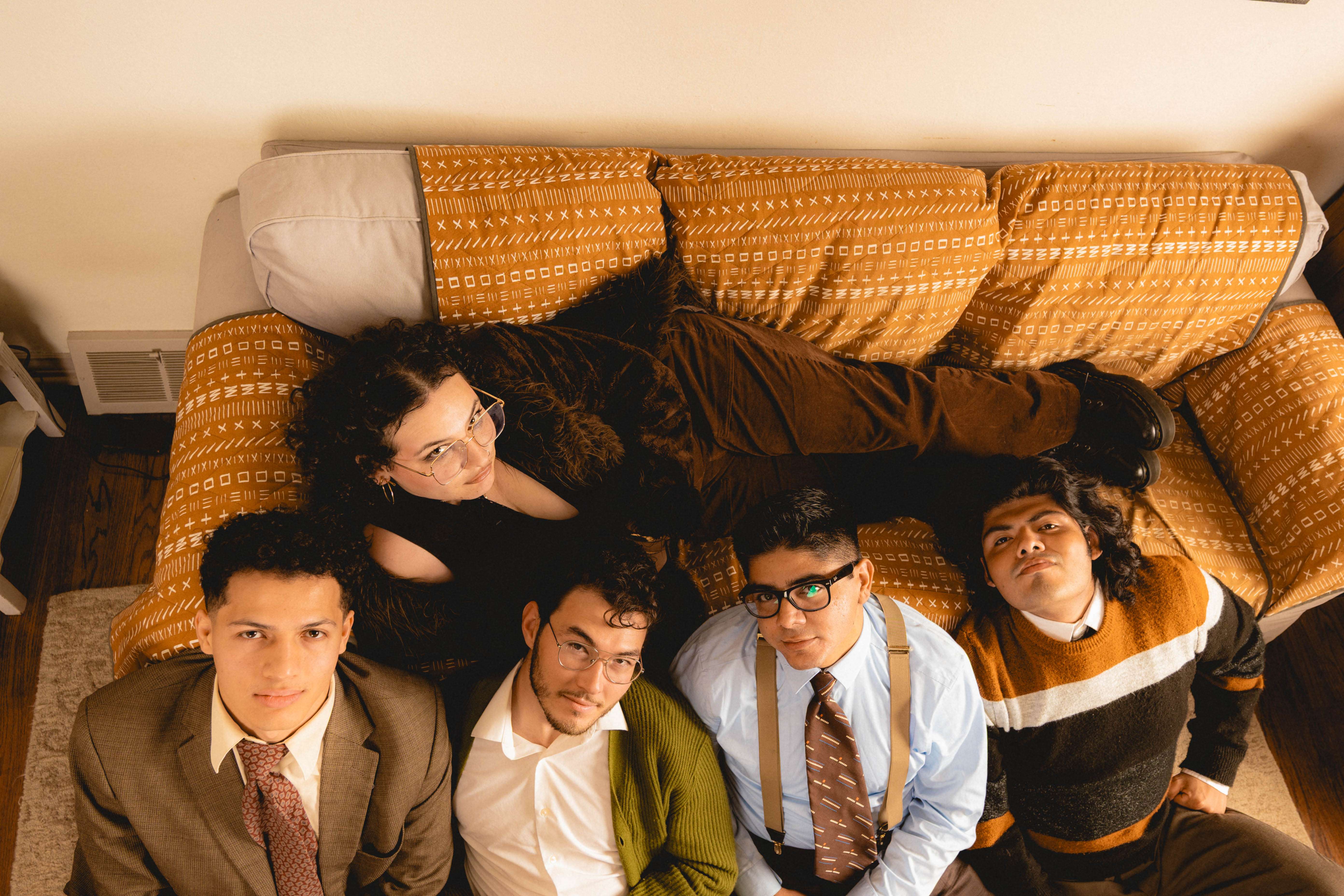 a group of people laying on a couch