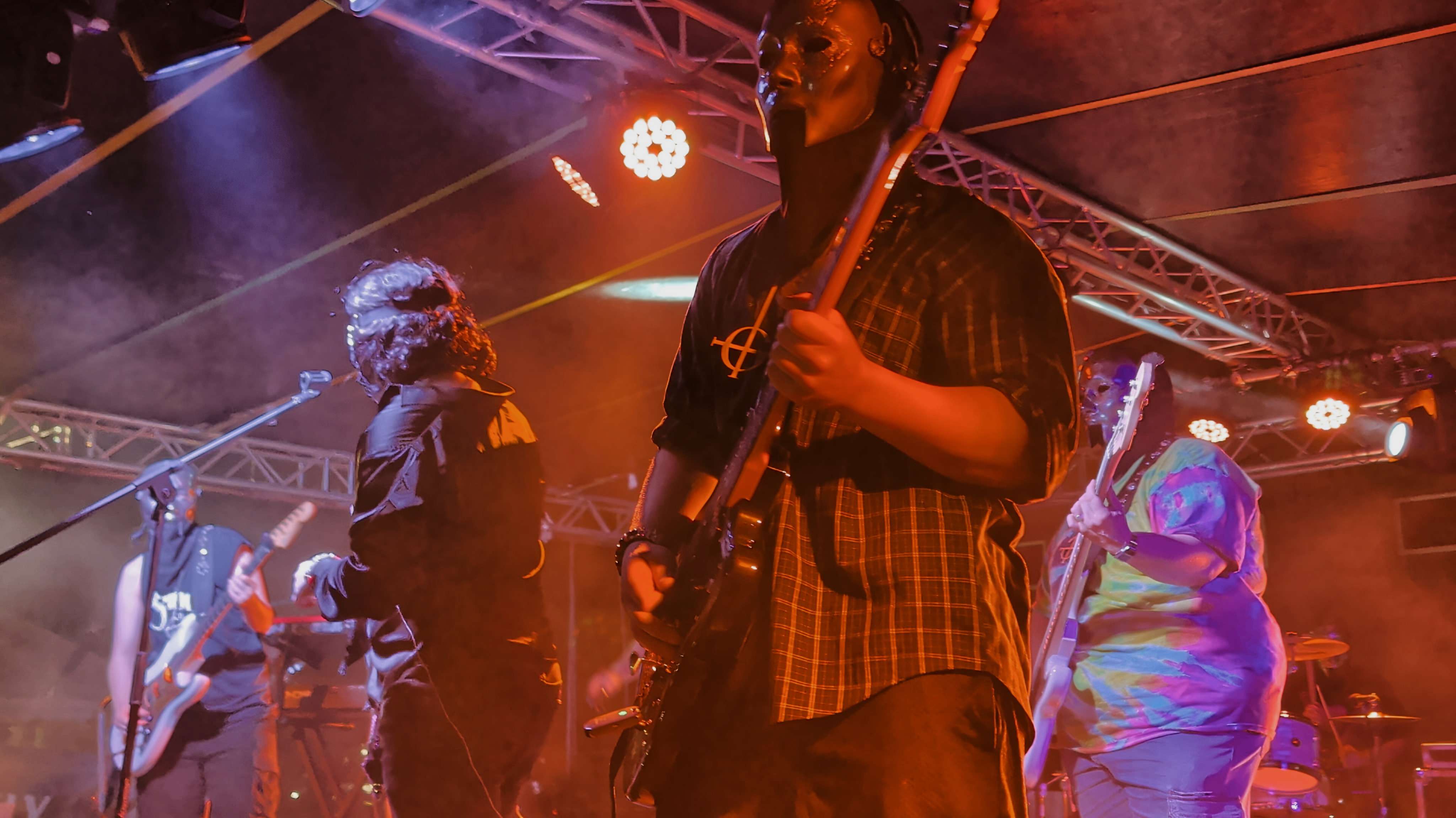a group of people on stage at a concert
