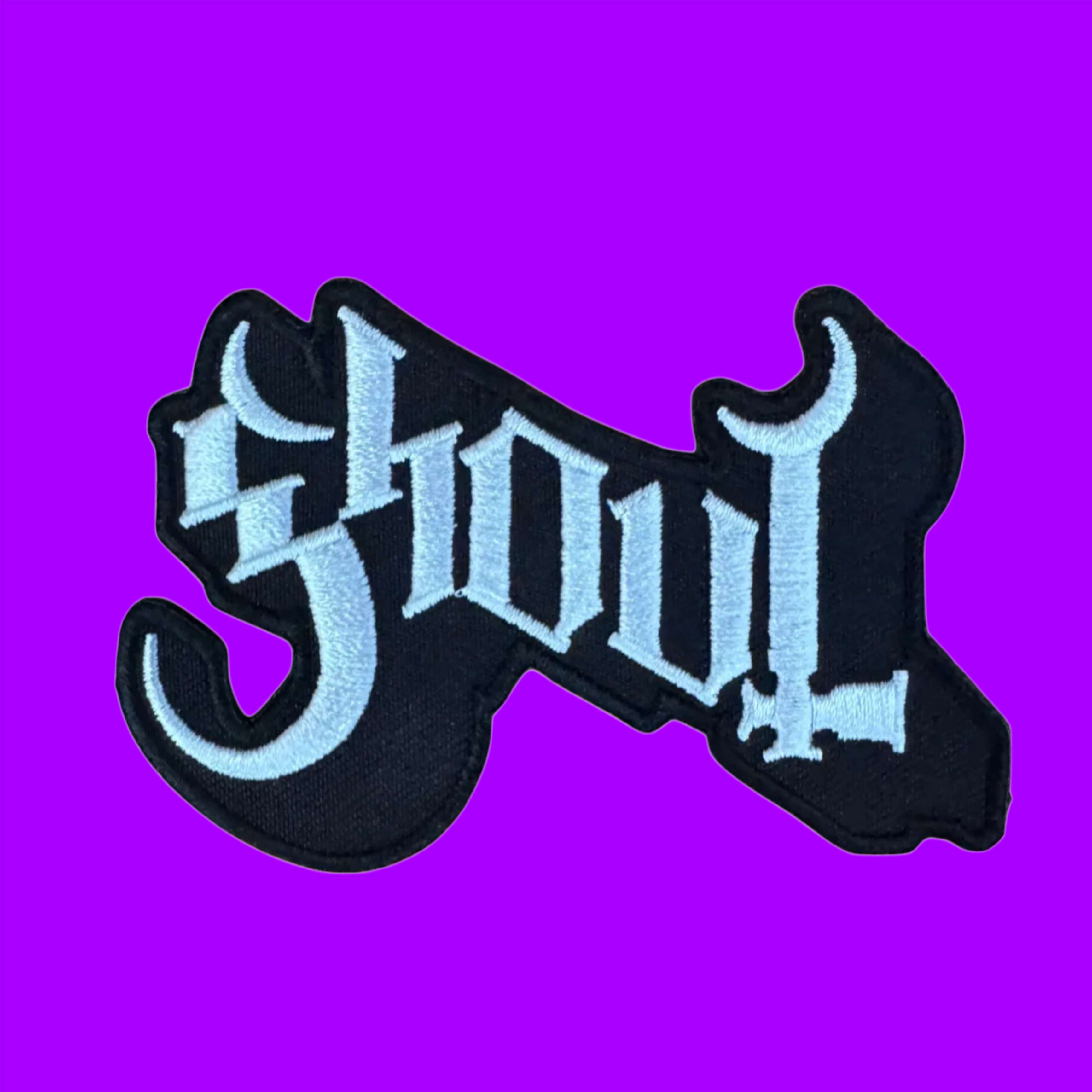 a purple background with the word ghoul on it