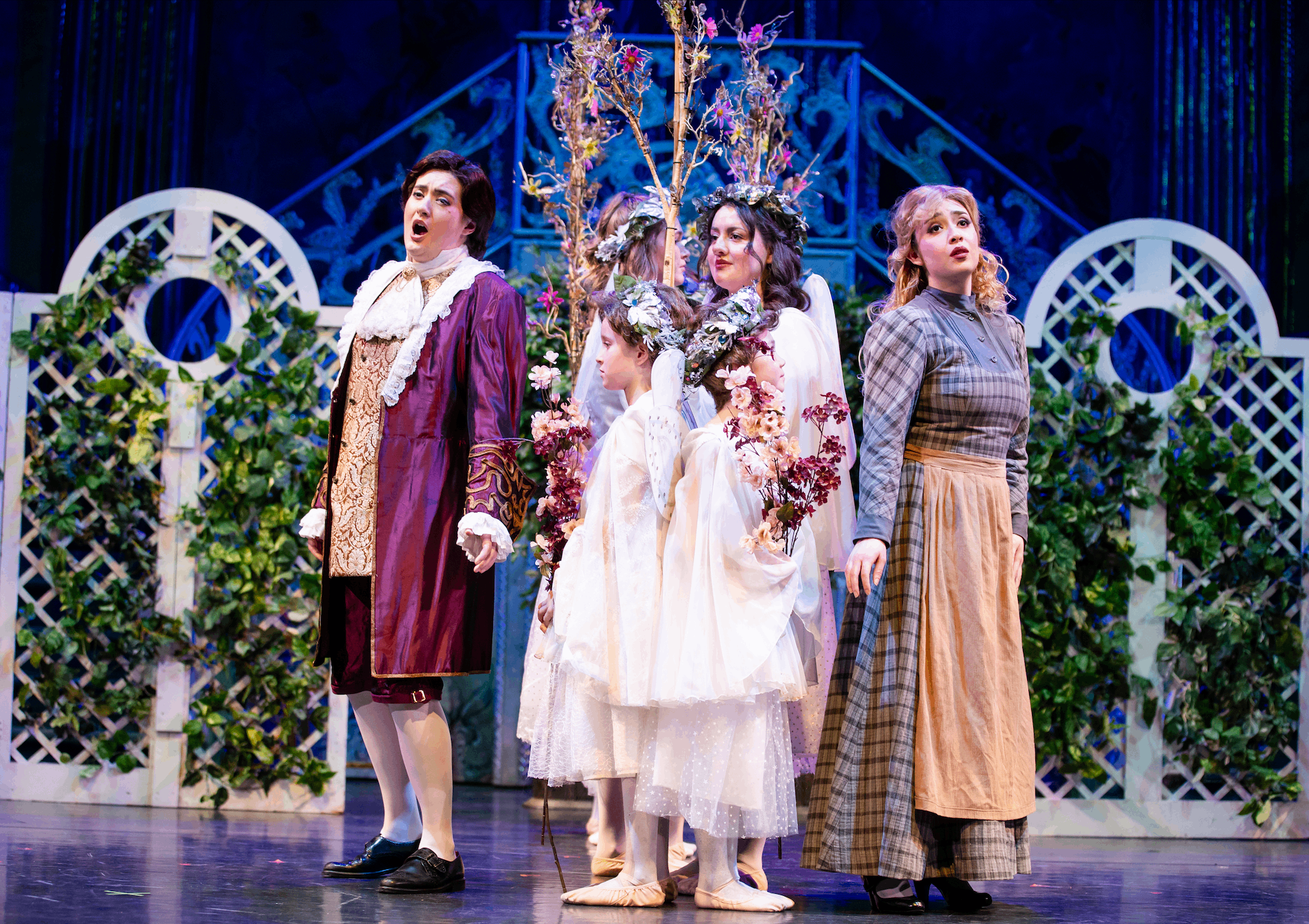 a group of people standing on a stage