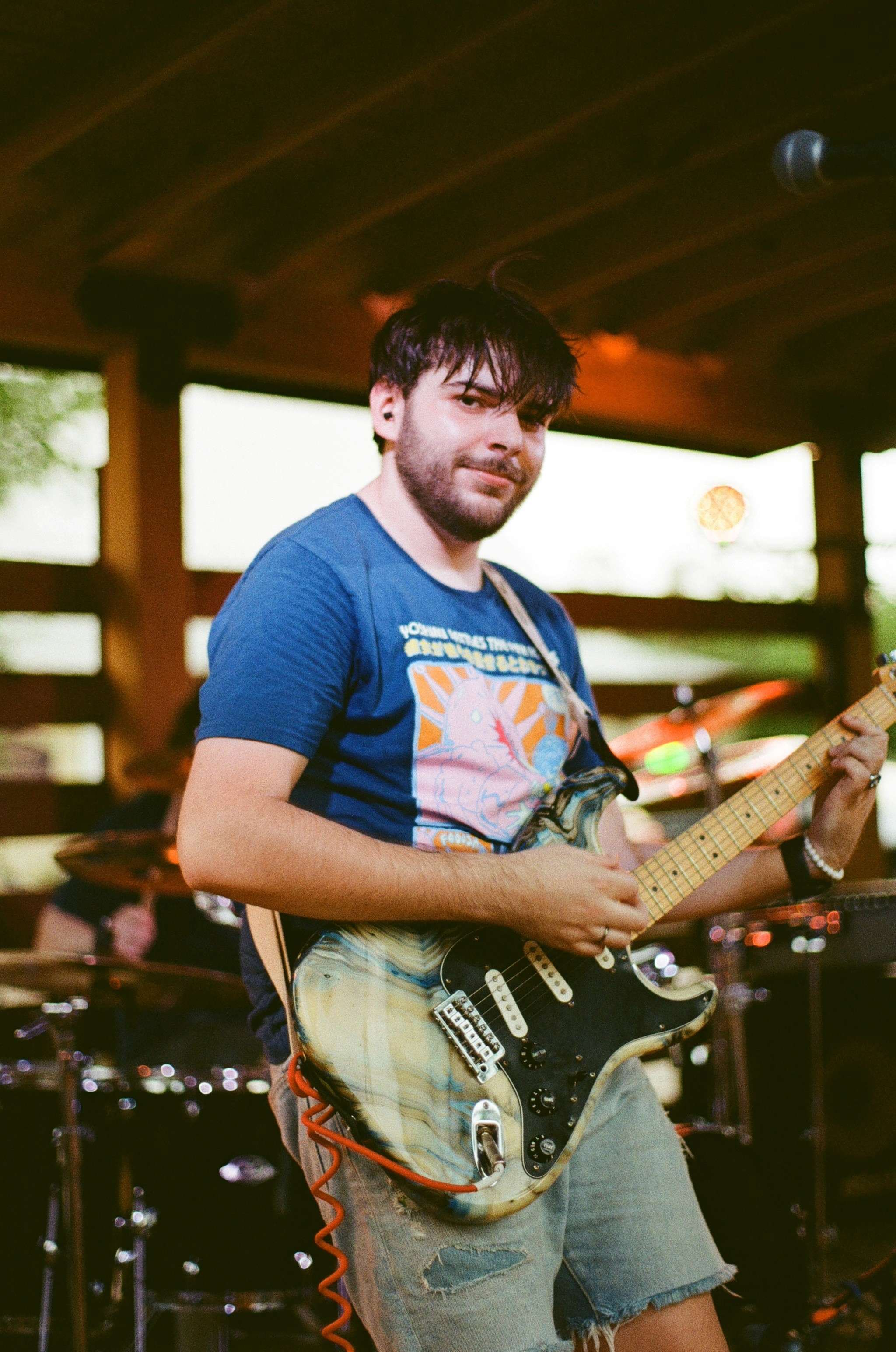 a man playing a guitar
