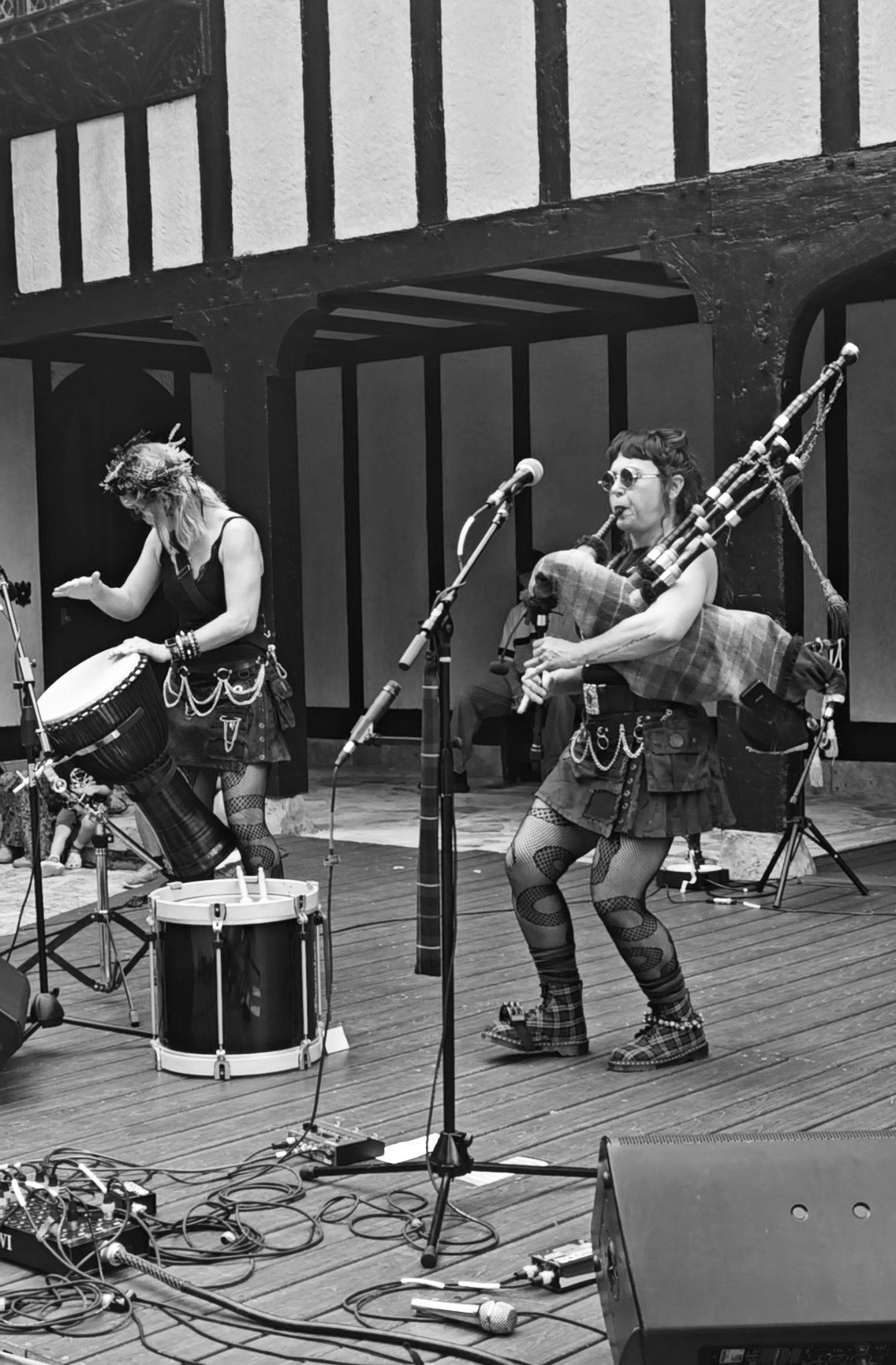 a group of people playing instruments on a stage