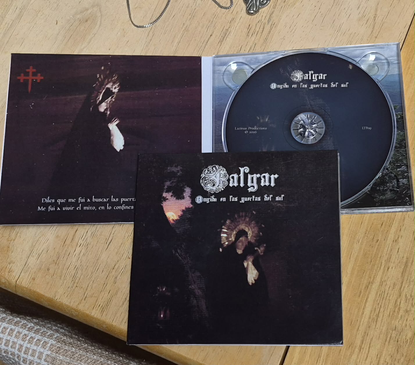 a cd with an image of a demon on it