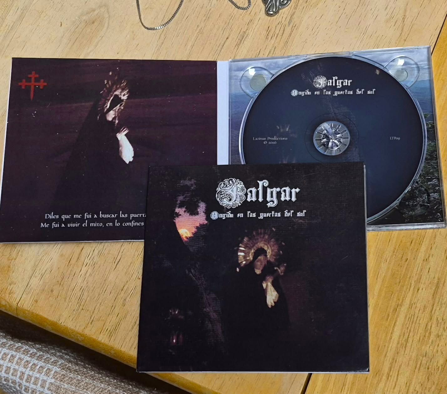 a cd with an image of a demon on it