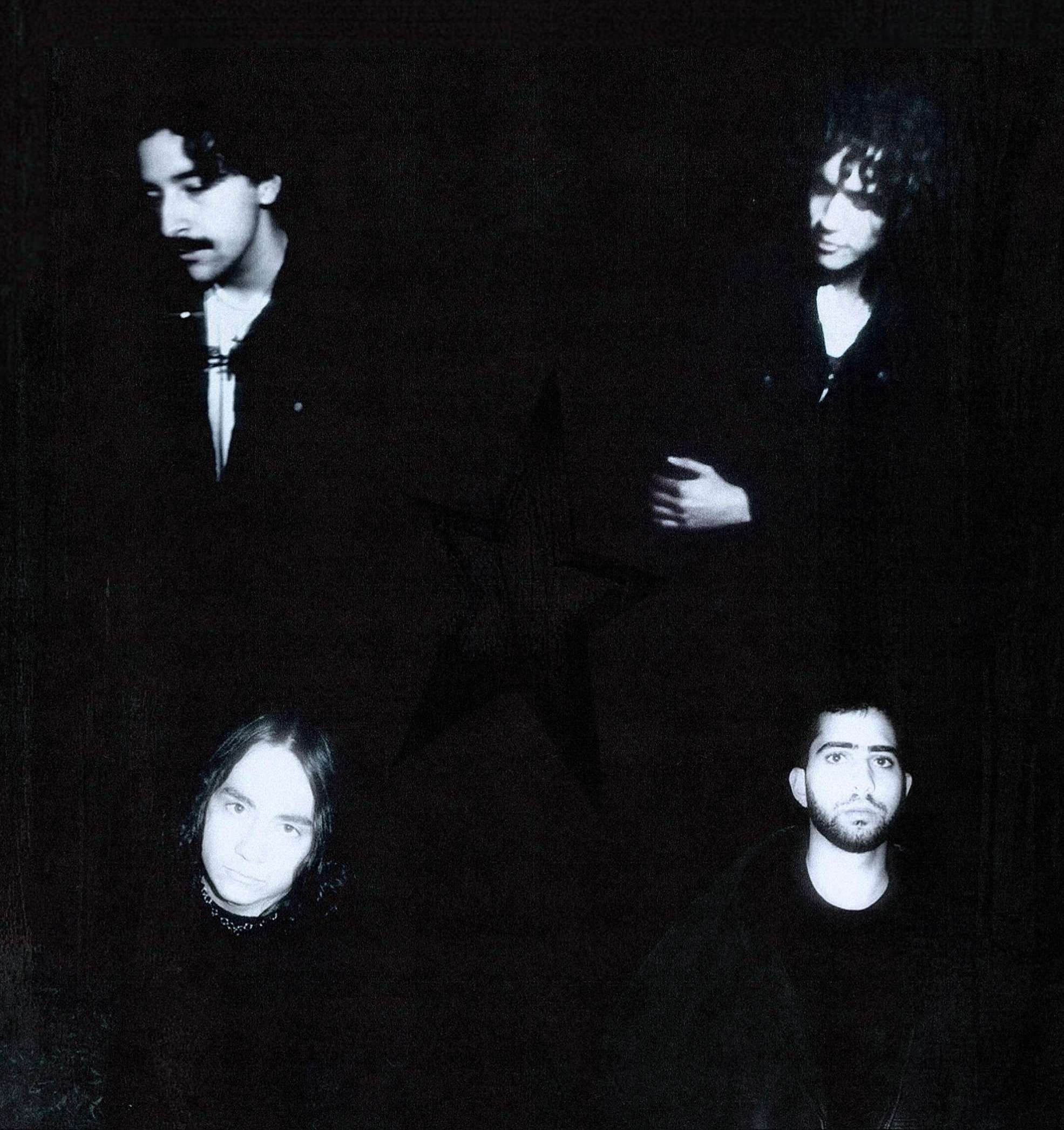 a black and white photo of a group of men