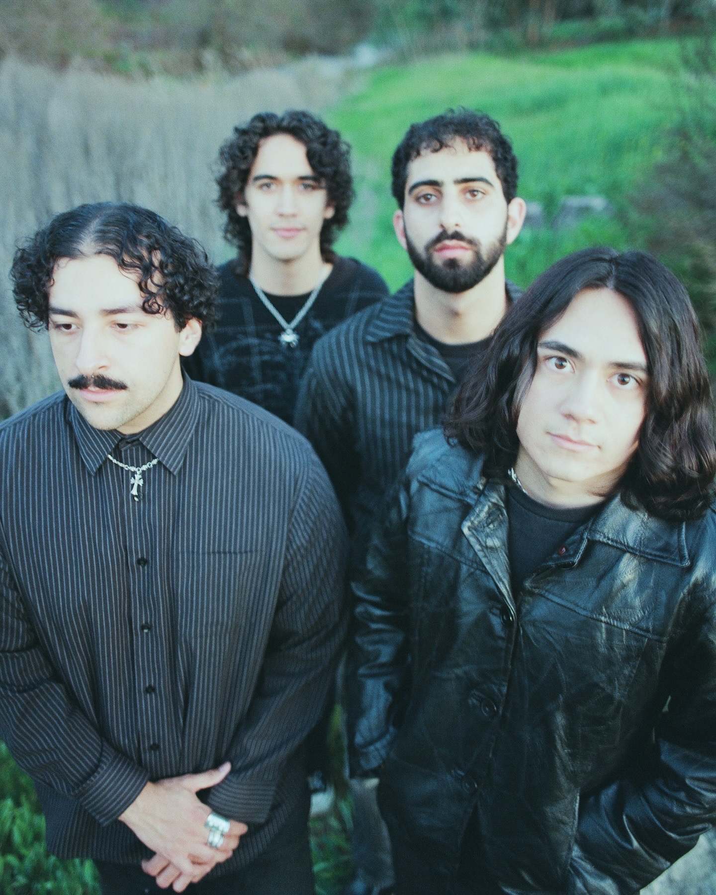 a group of men standing next to each other