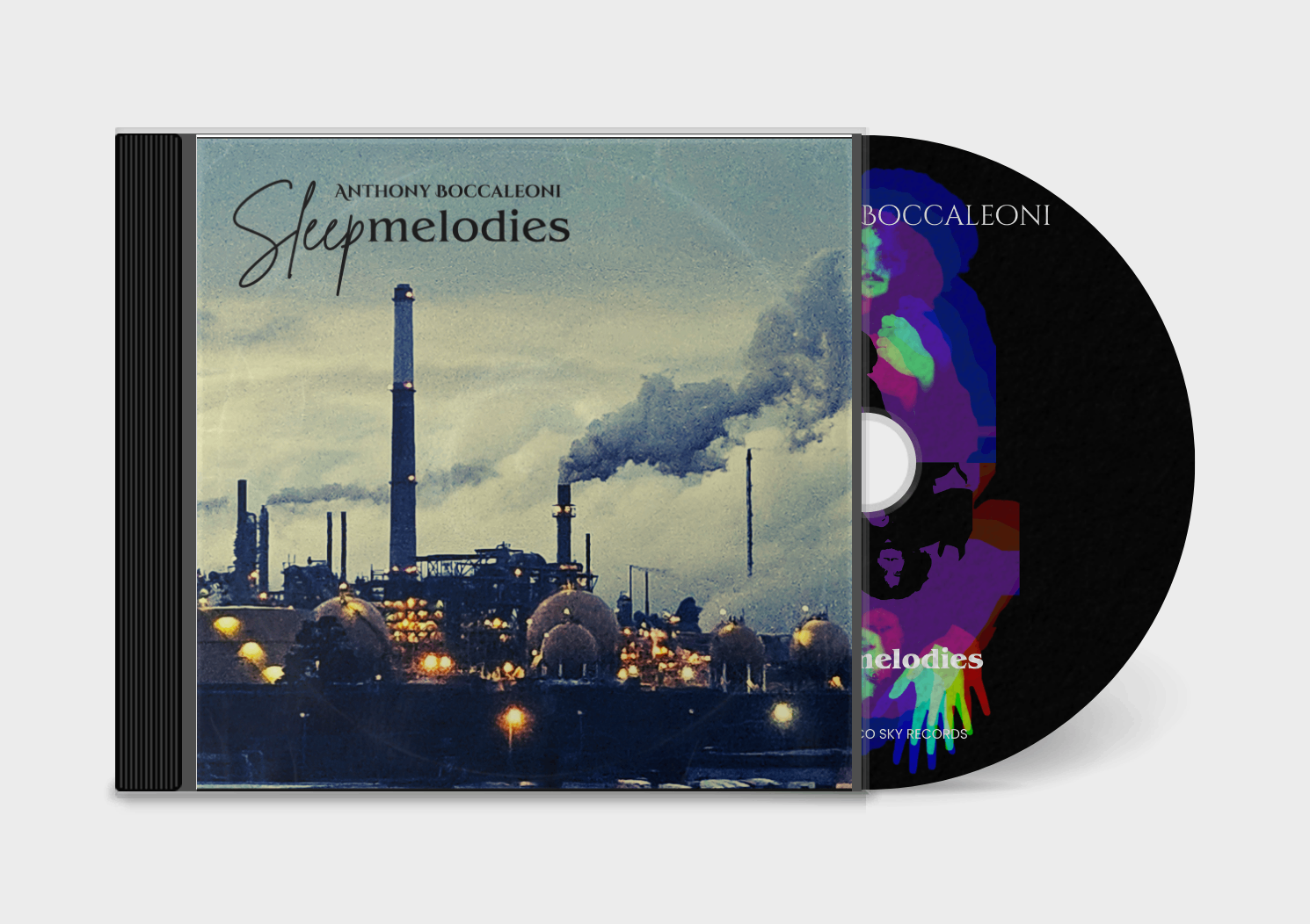 a cd with an image of a factory with smoke coming out of it