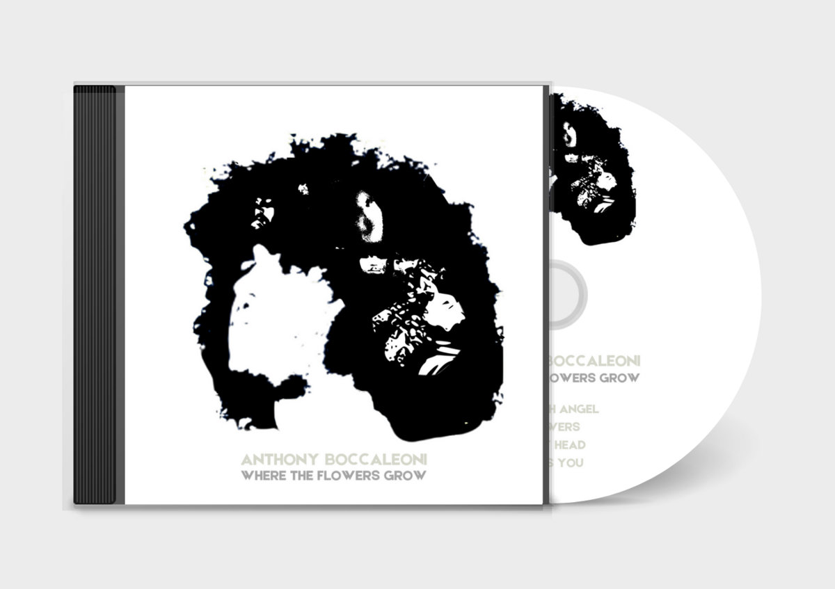 a black and white cd with an image of a man's head