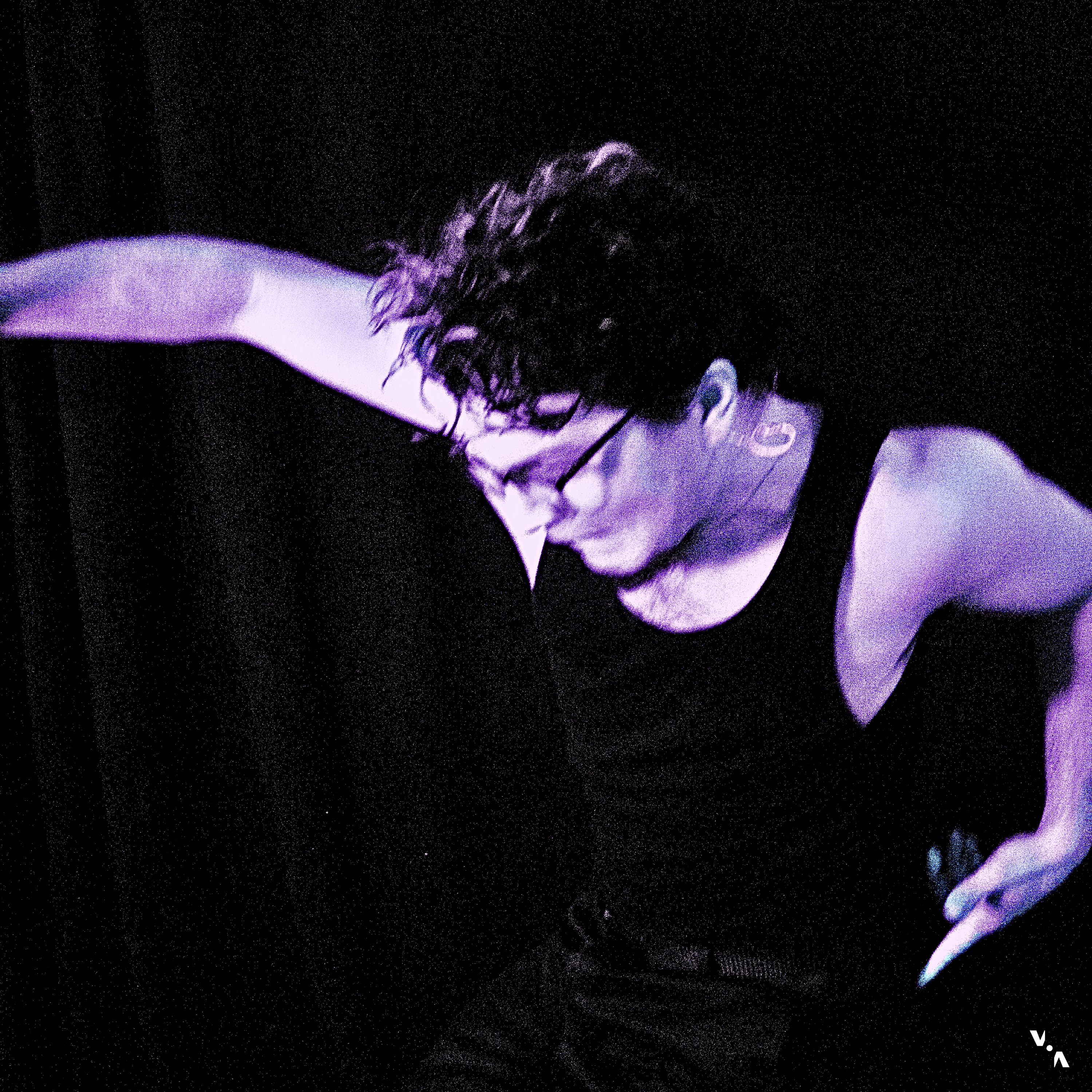 Between - SPINNING: a man wearing a black tank top
