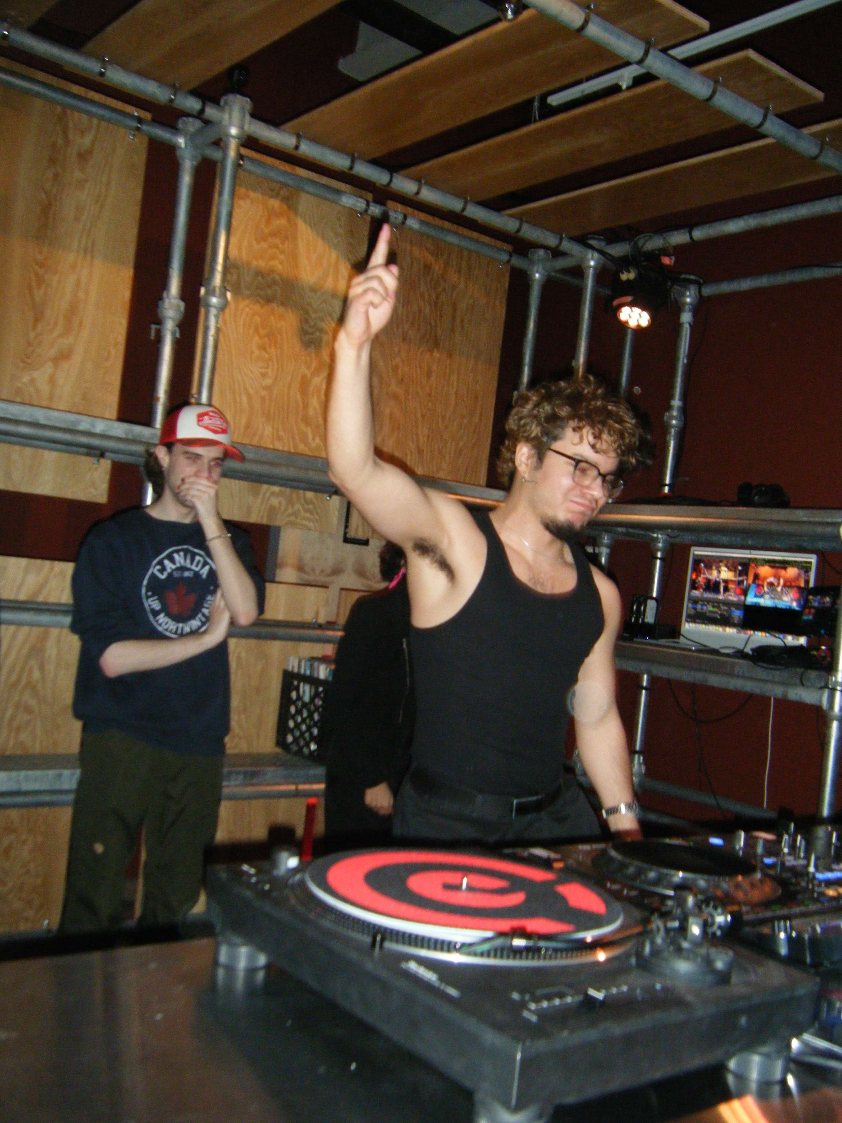 a man in a black tank top