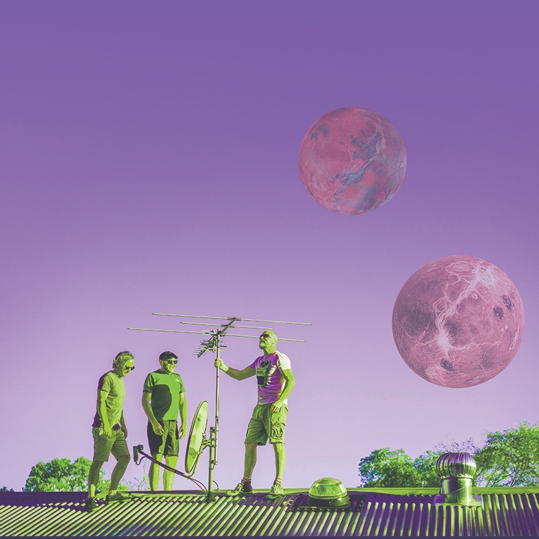 a group of people standing on a roof