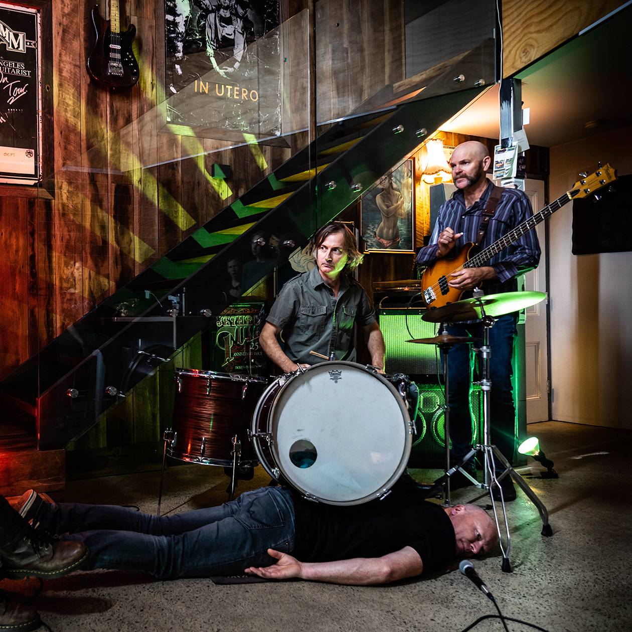 a group of people playing music in a bar