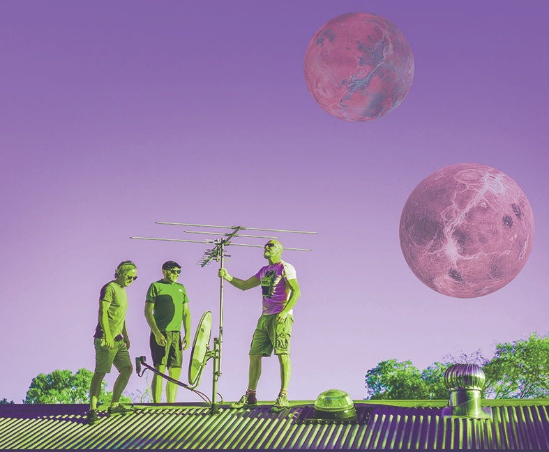 a group of people standing on a roof