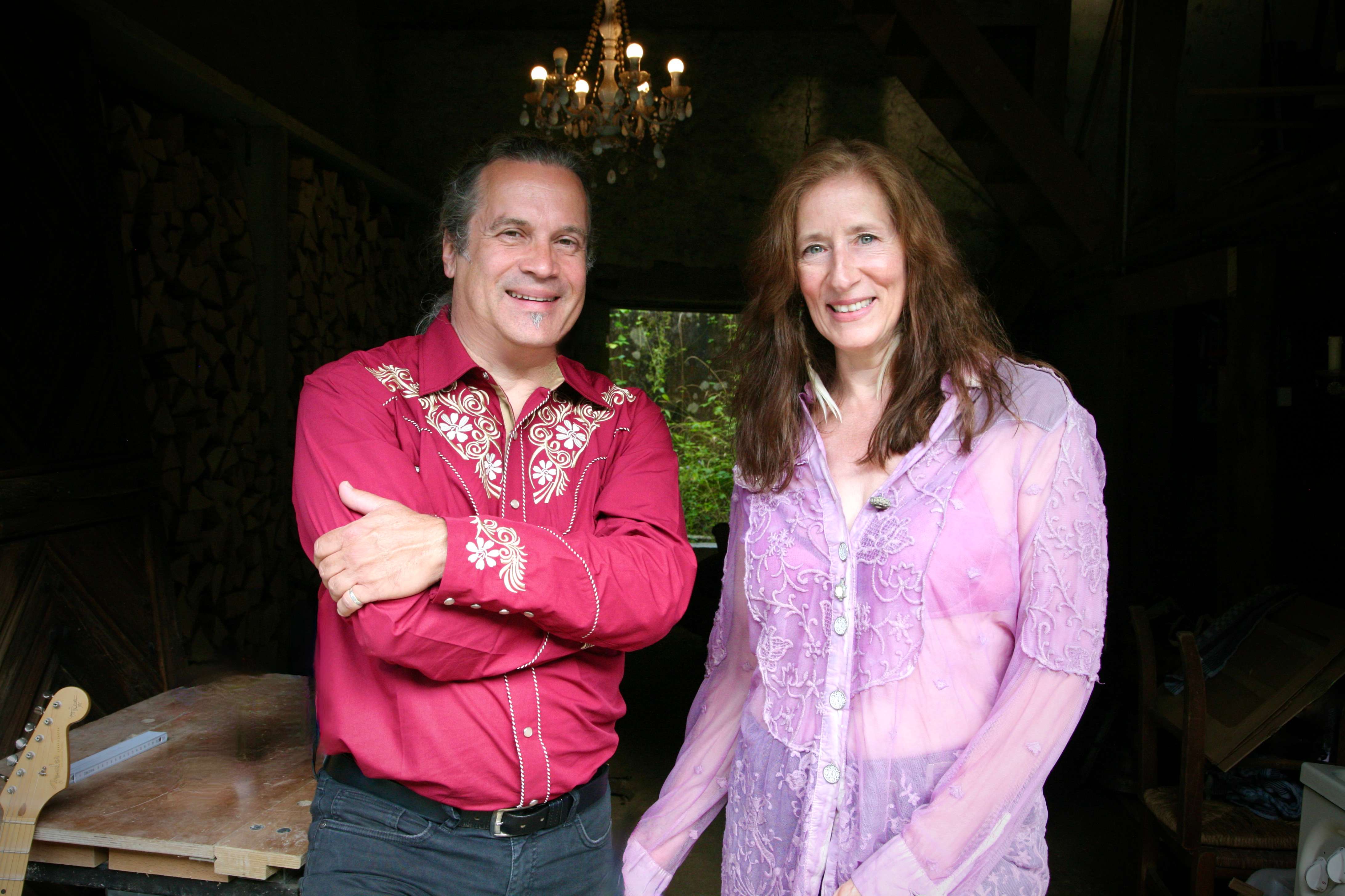 a man and woman standing next to each other