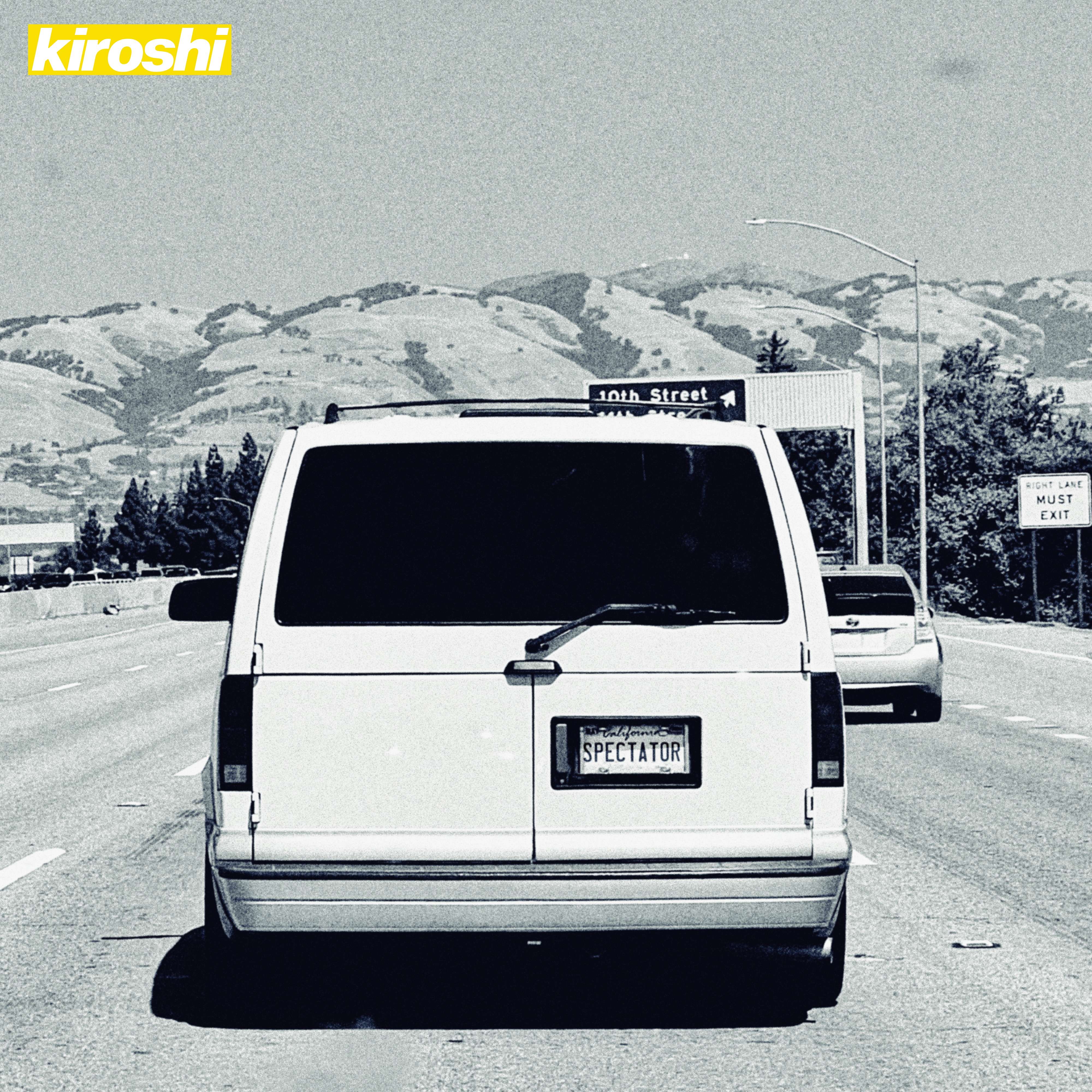 a white van driving down the road