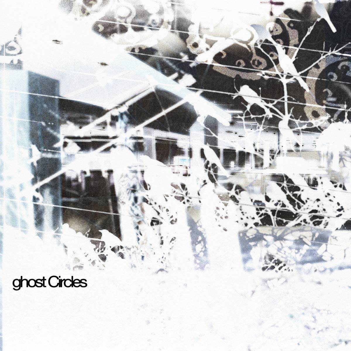 a picture of a broken window with the words ghost circles on it
