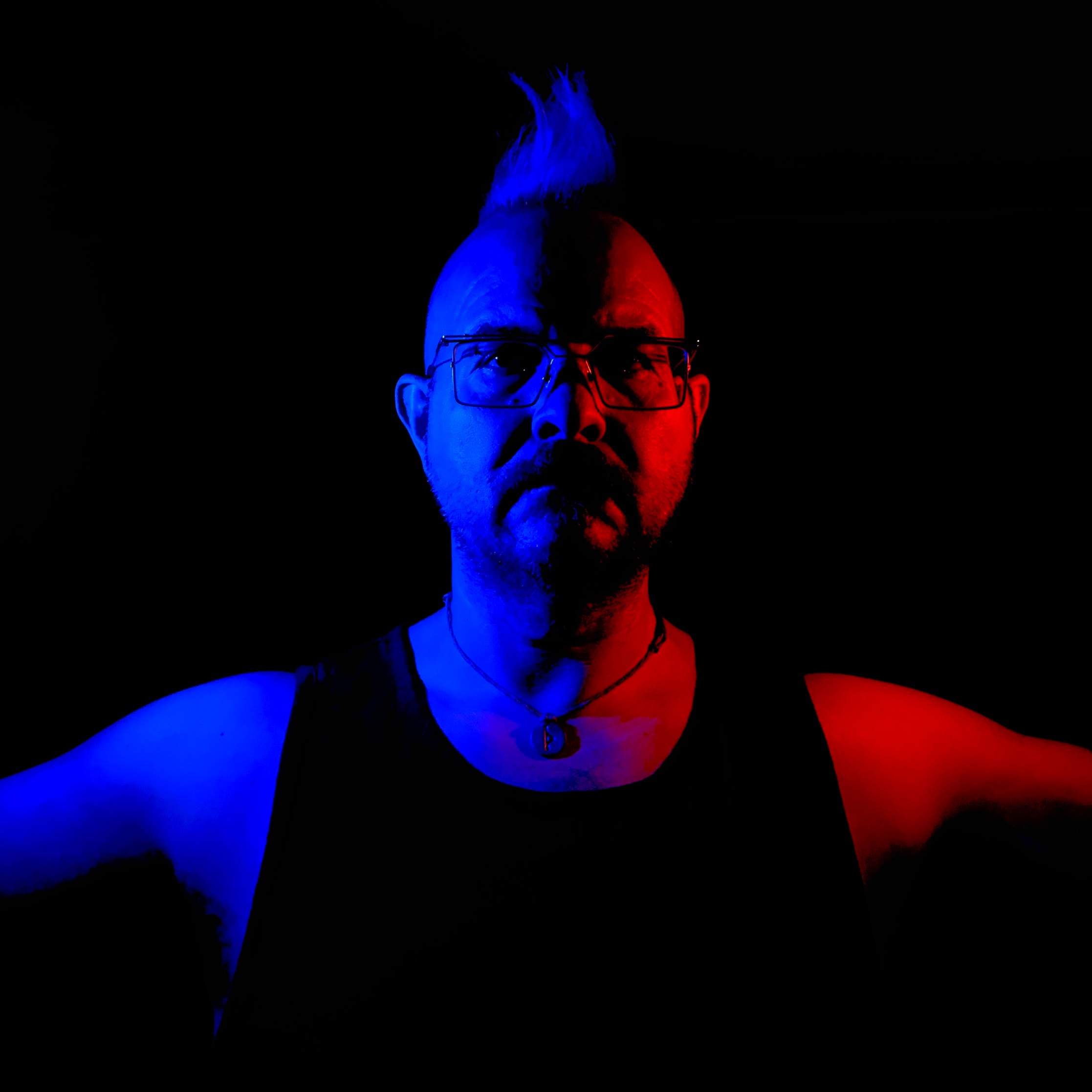 a man with blue and red hair