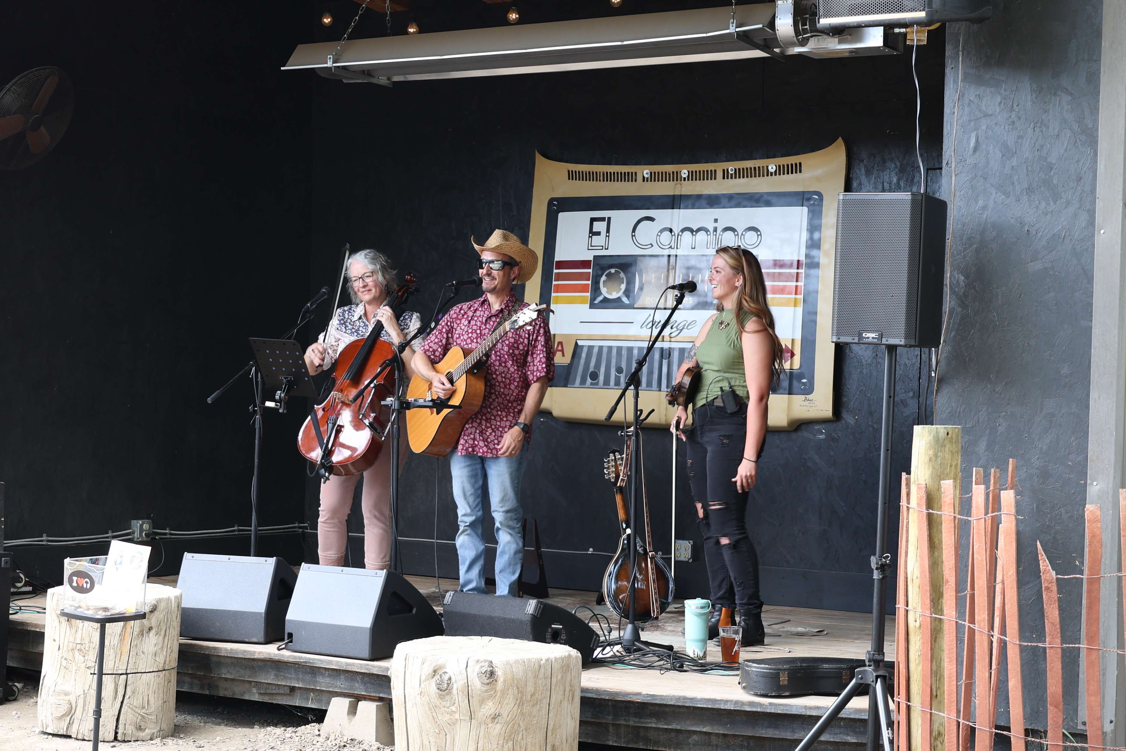 a group of people standing on a stage