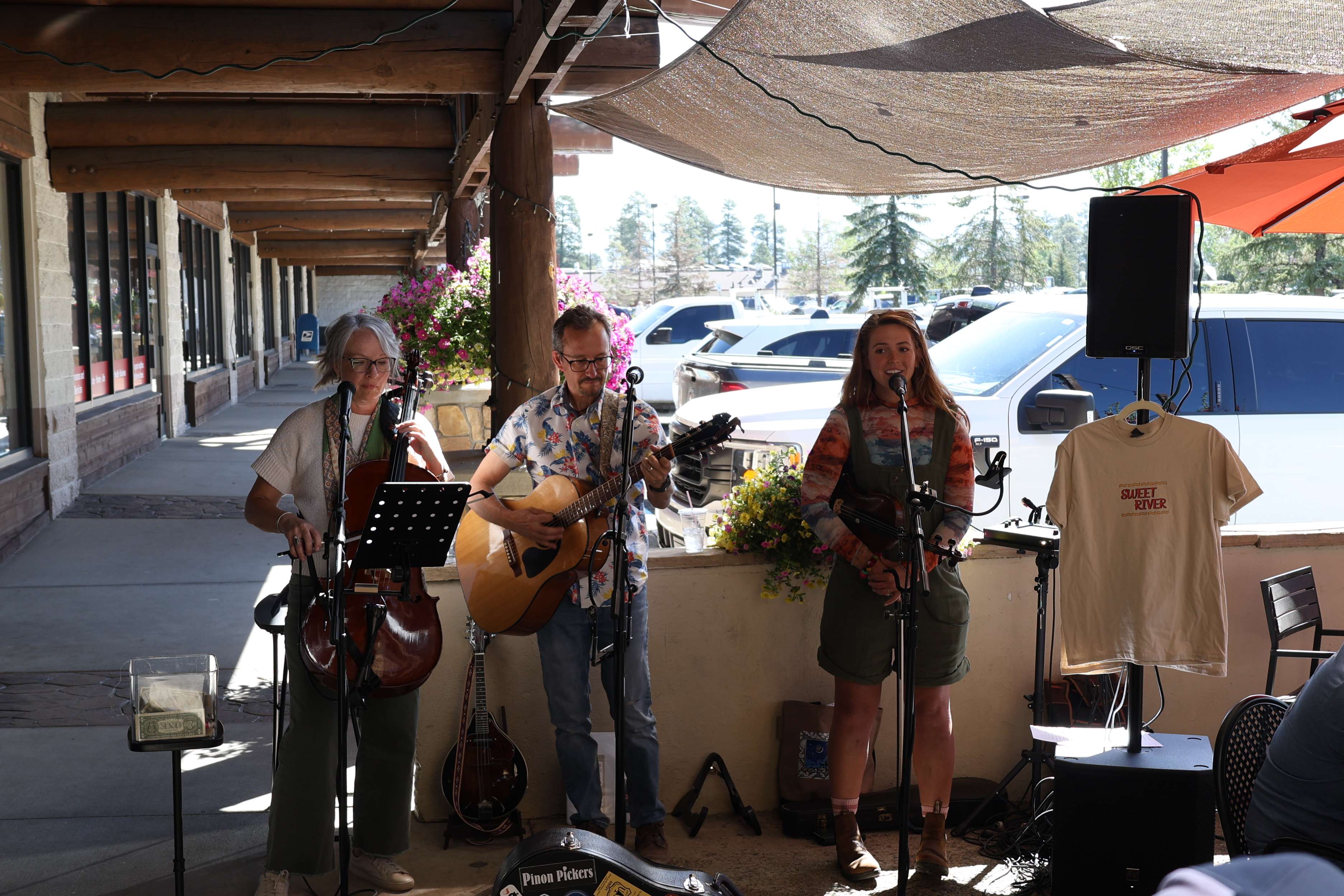 a group of people playing music outdoors