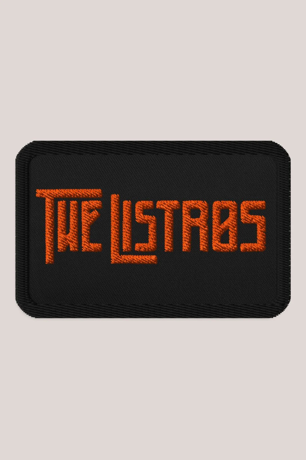 a black patch with the word'the listrs'on it