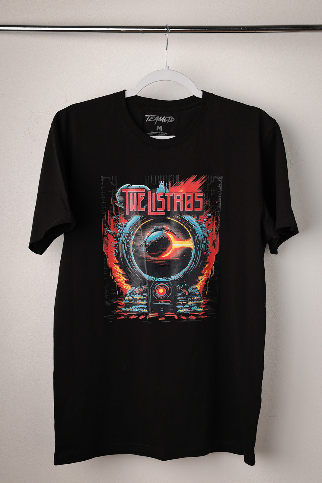 a black t - shirt with an image of a fireball on it