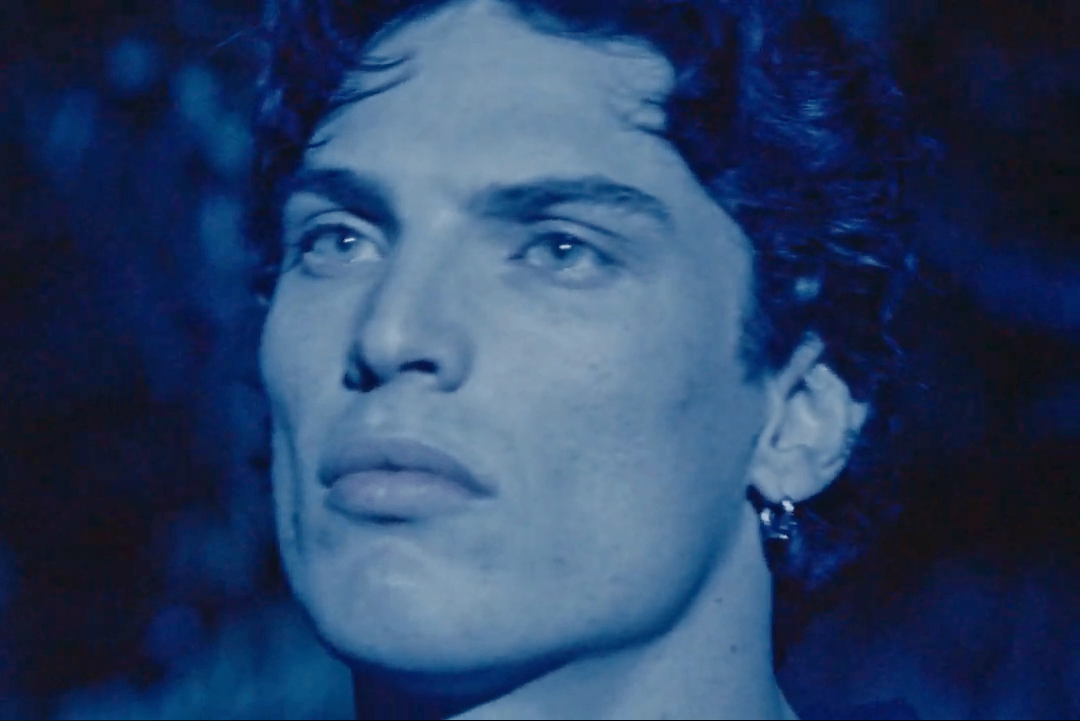 Zev Adams tip jar: a man in a blue shirt is staring at the camera