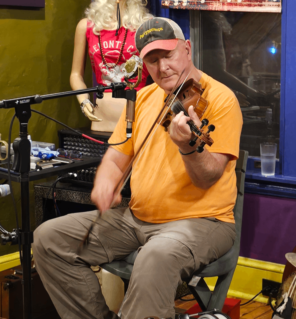 a man playing a violin